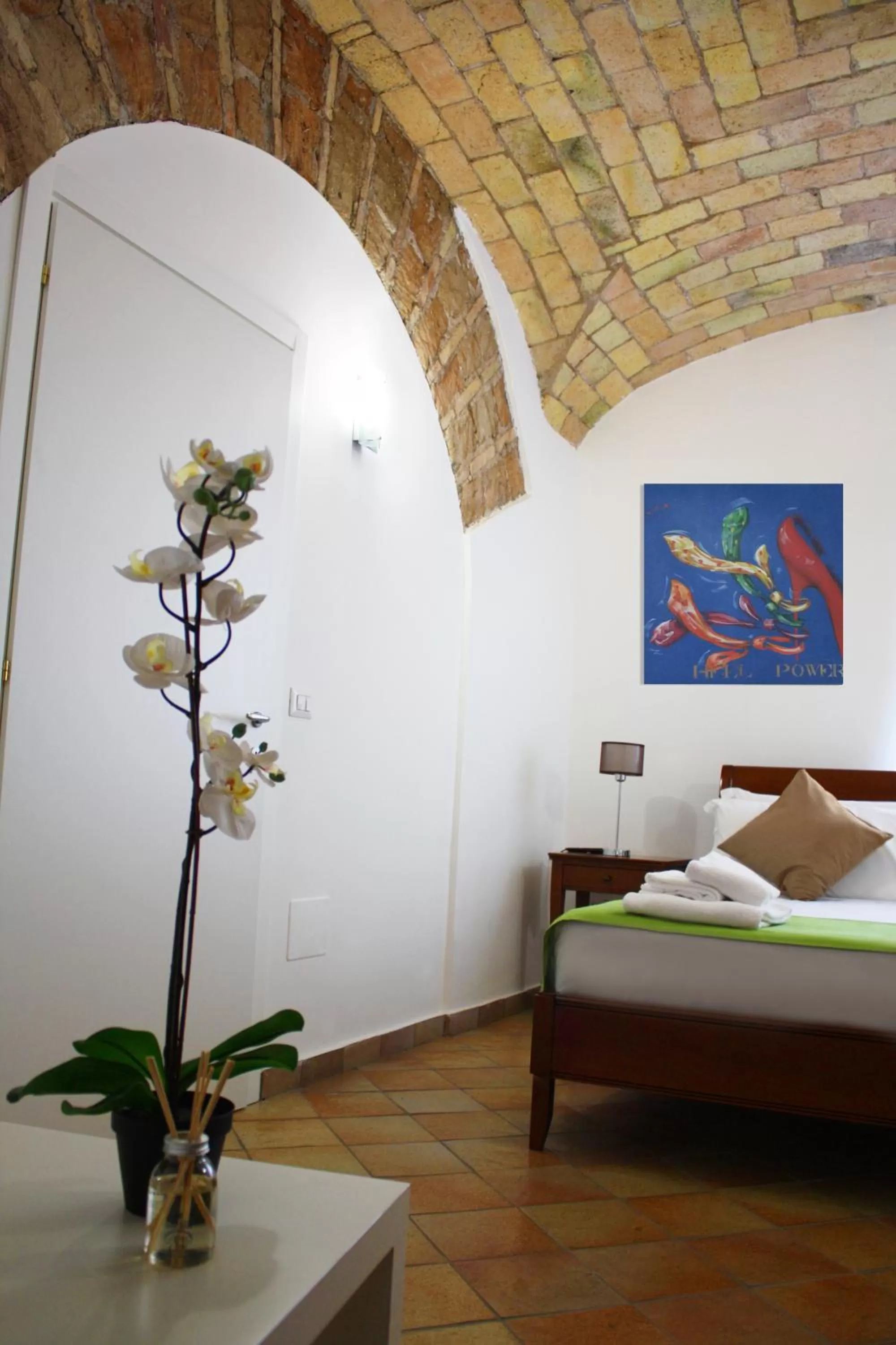 Bed in Roma Resort Colosseum