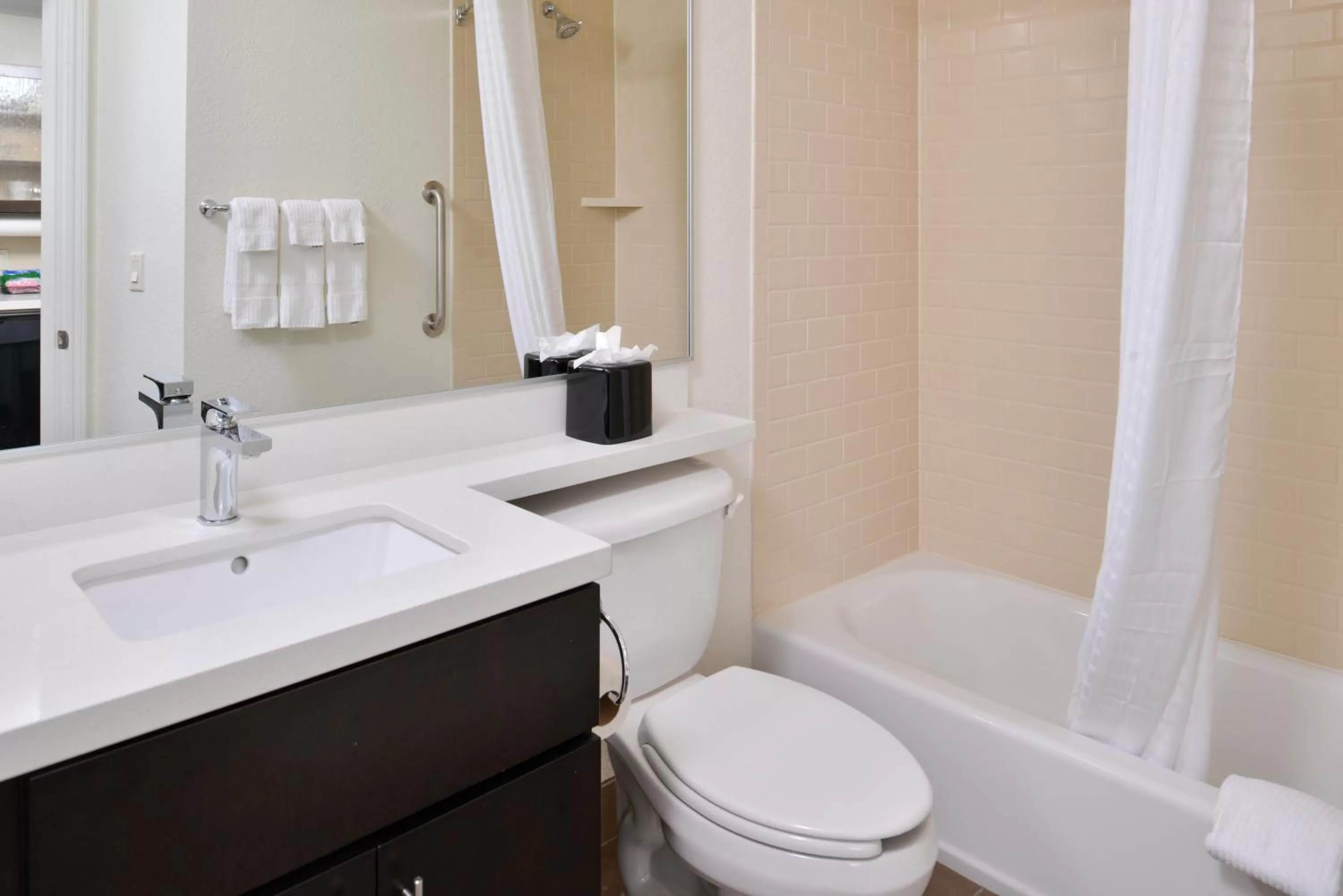 Bathroom in Candlewood Suites Beaumont by IHG