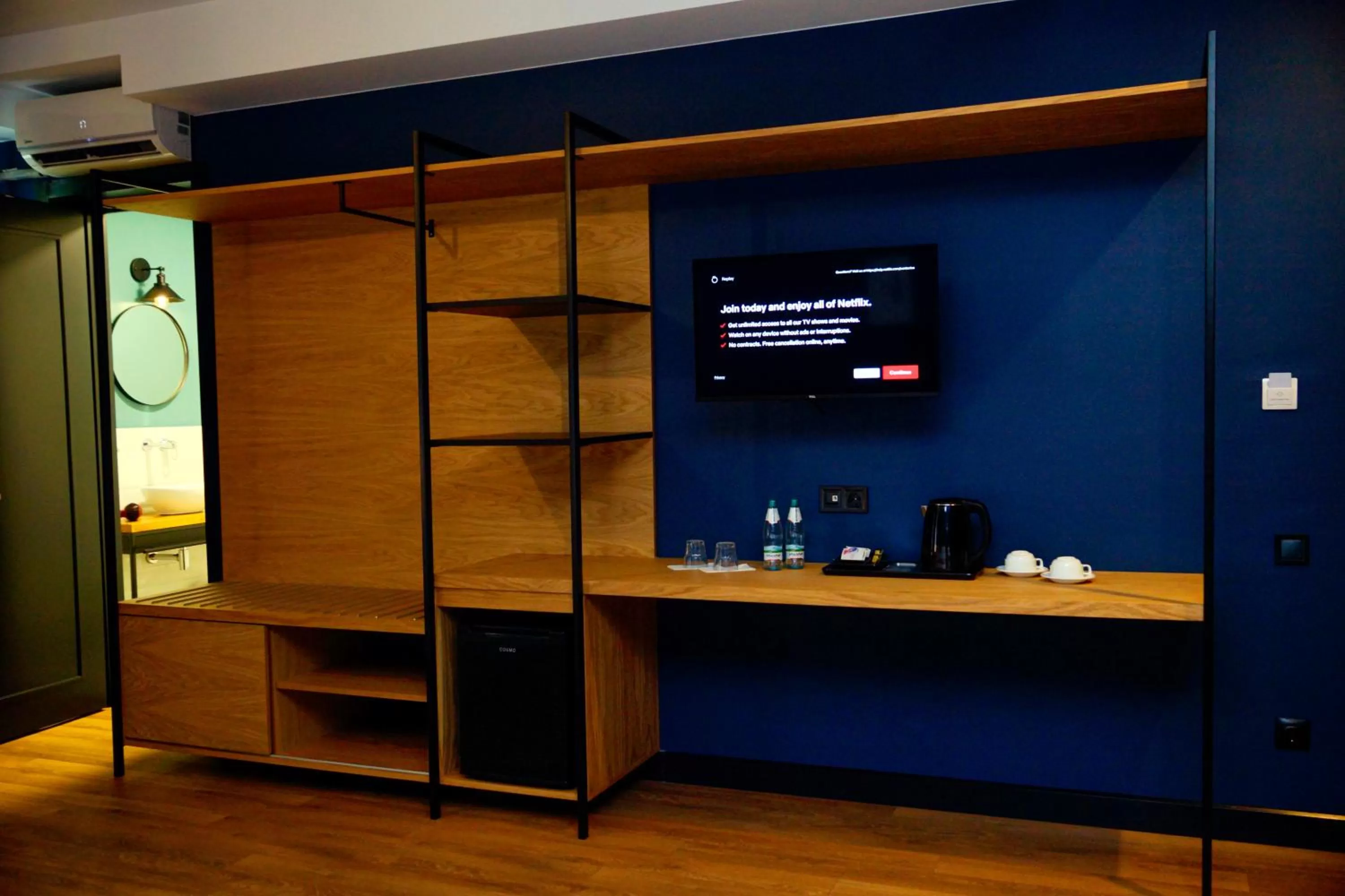 Communal lounge/ TV room, TV/Entertainment Center in Borjomi Bridge Hotel