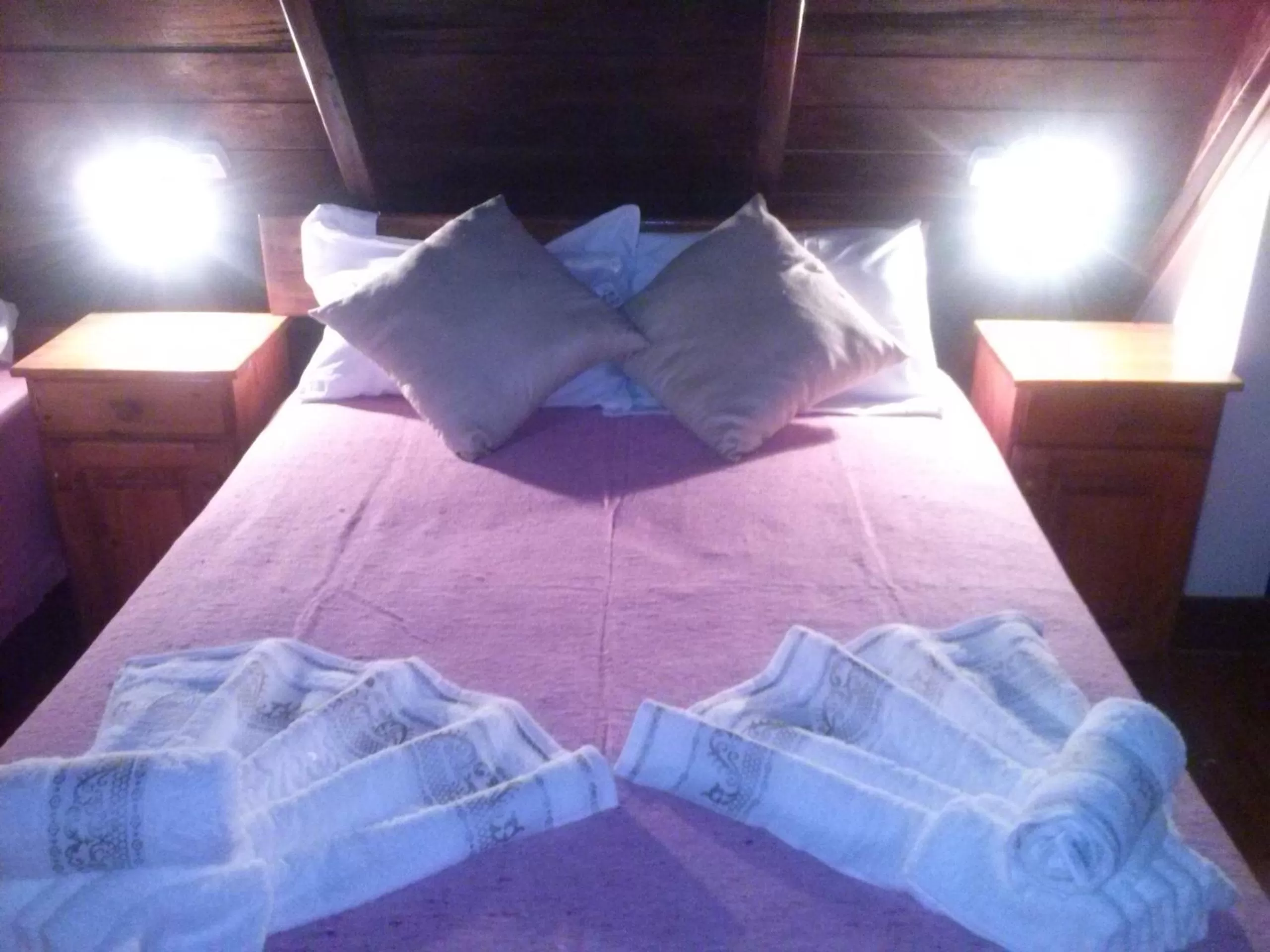 Bed in Petit Hotel Caraguata