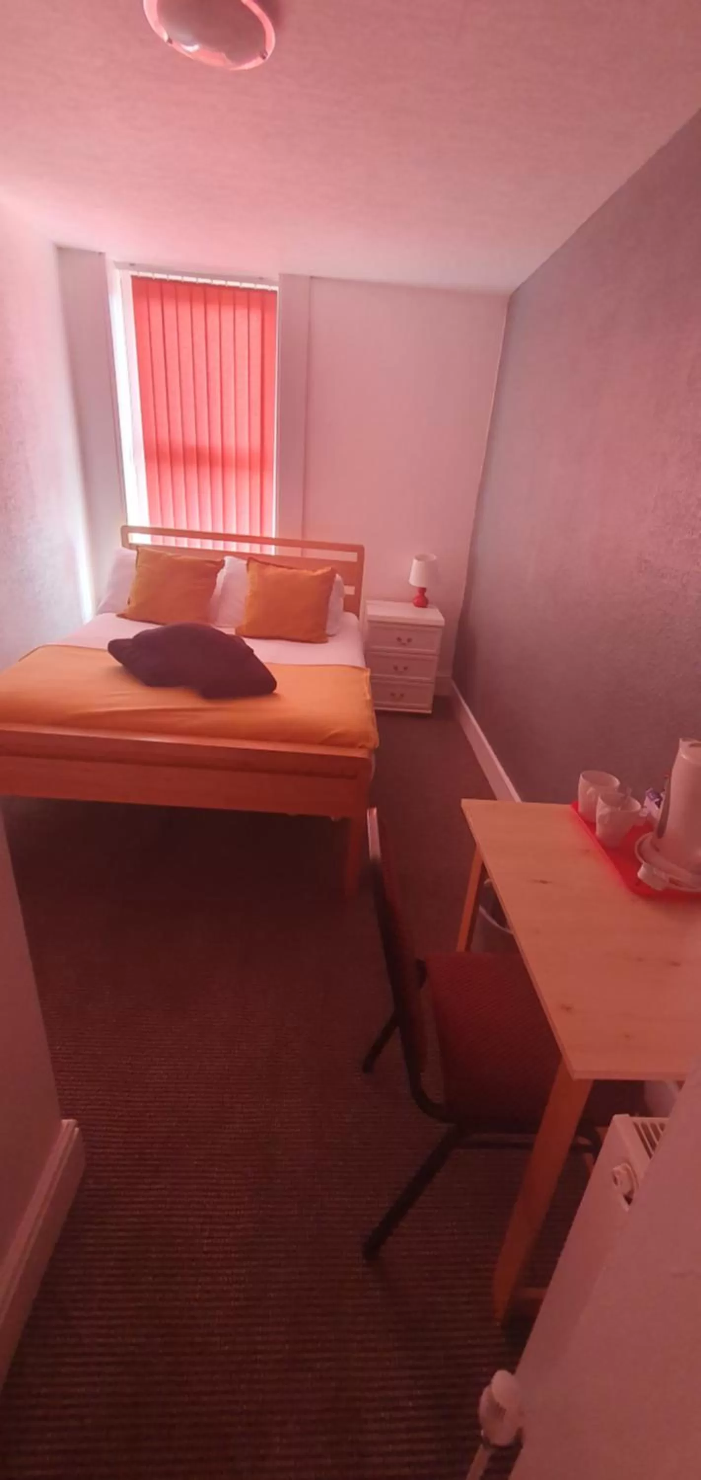 Bed in Palm Beach Hotel by the Sea