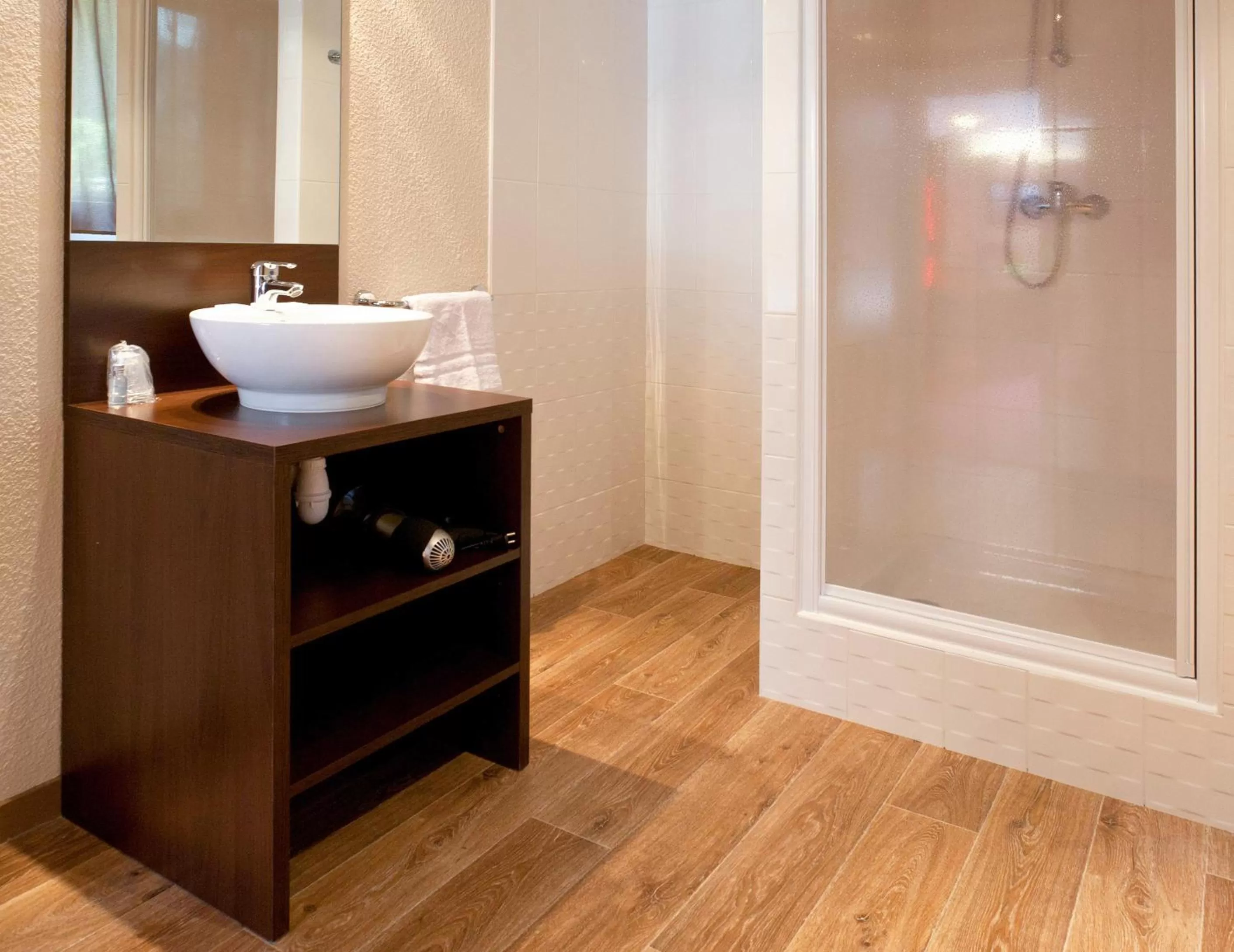 Bathroom in SOWELL HOTELS Mont Blanc et SPA