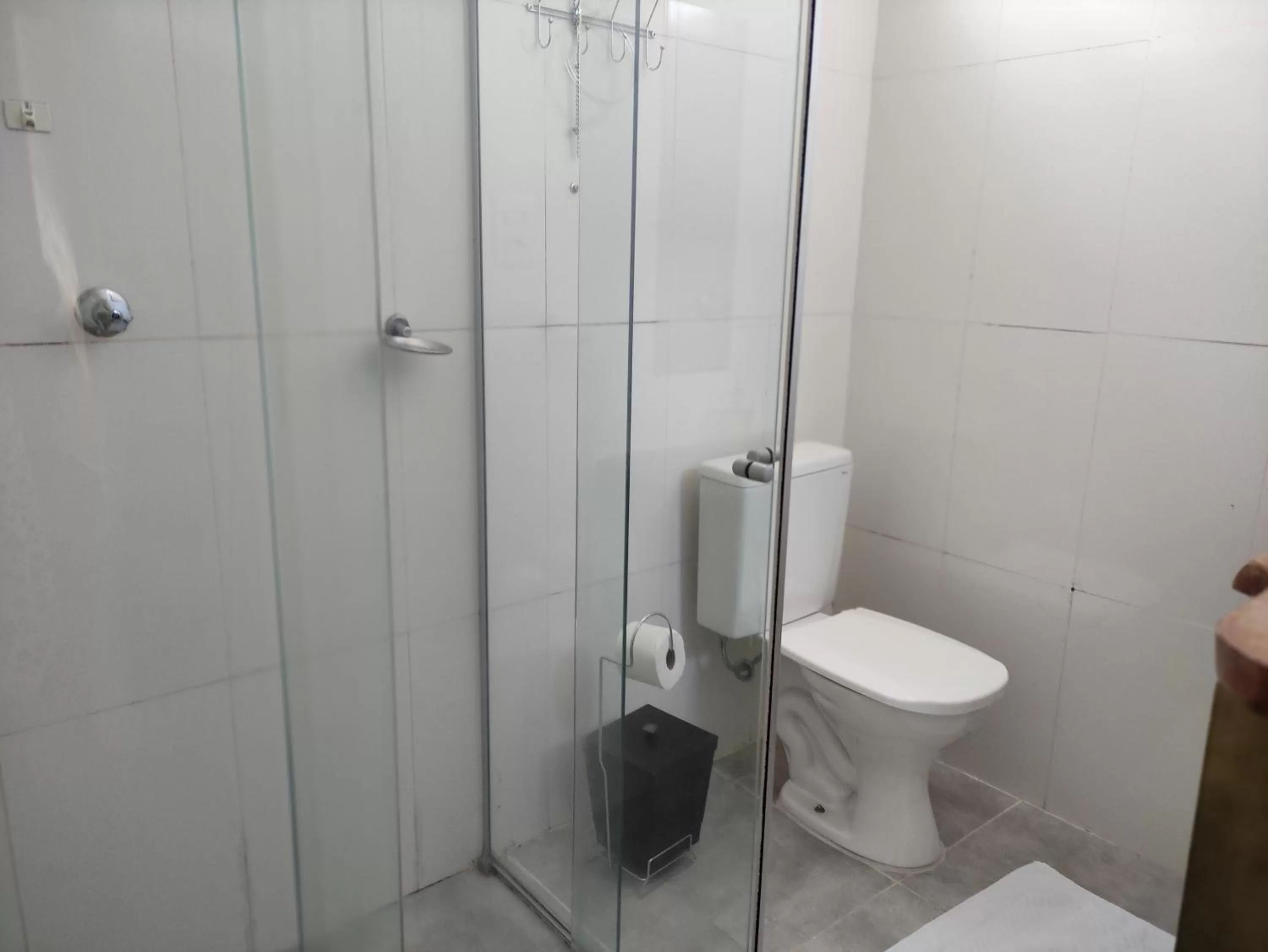 Bathroom in Pousada da Gi Suítes e Turismo