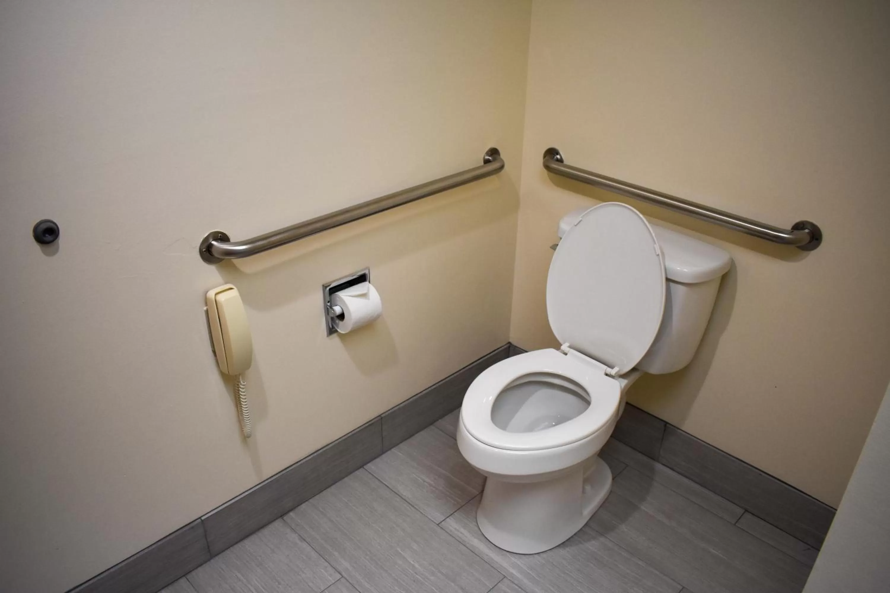 Bathroom in Super 8 by Wyndham Branson By Andy Williams Theatre