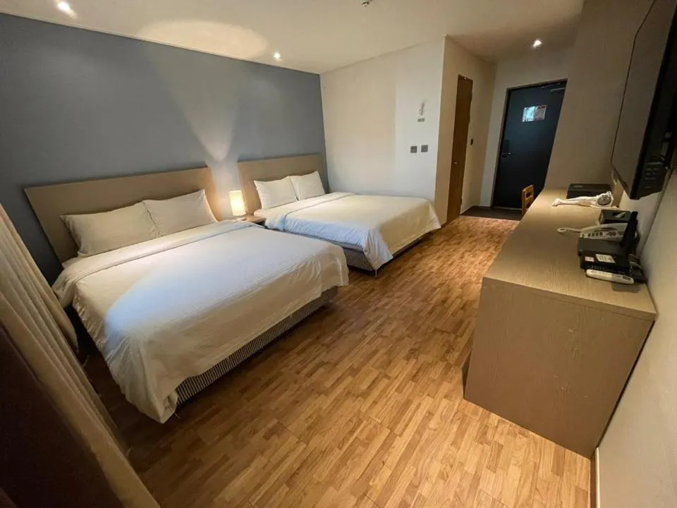 Bedroom, Bed in Sea Moon Tourist Hotel