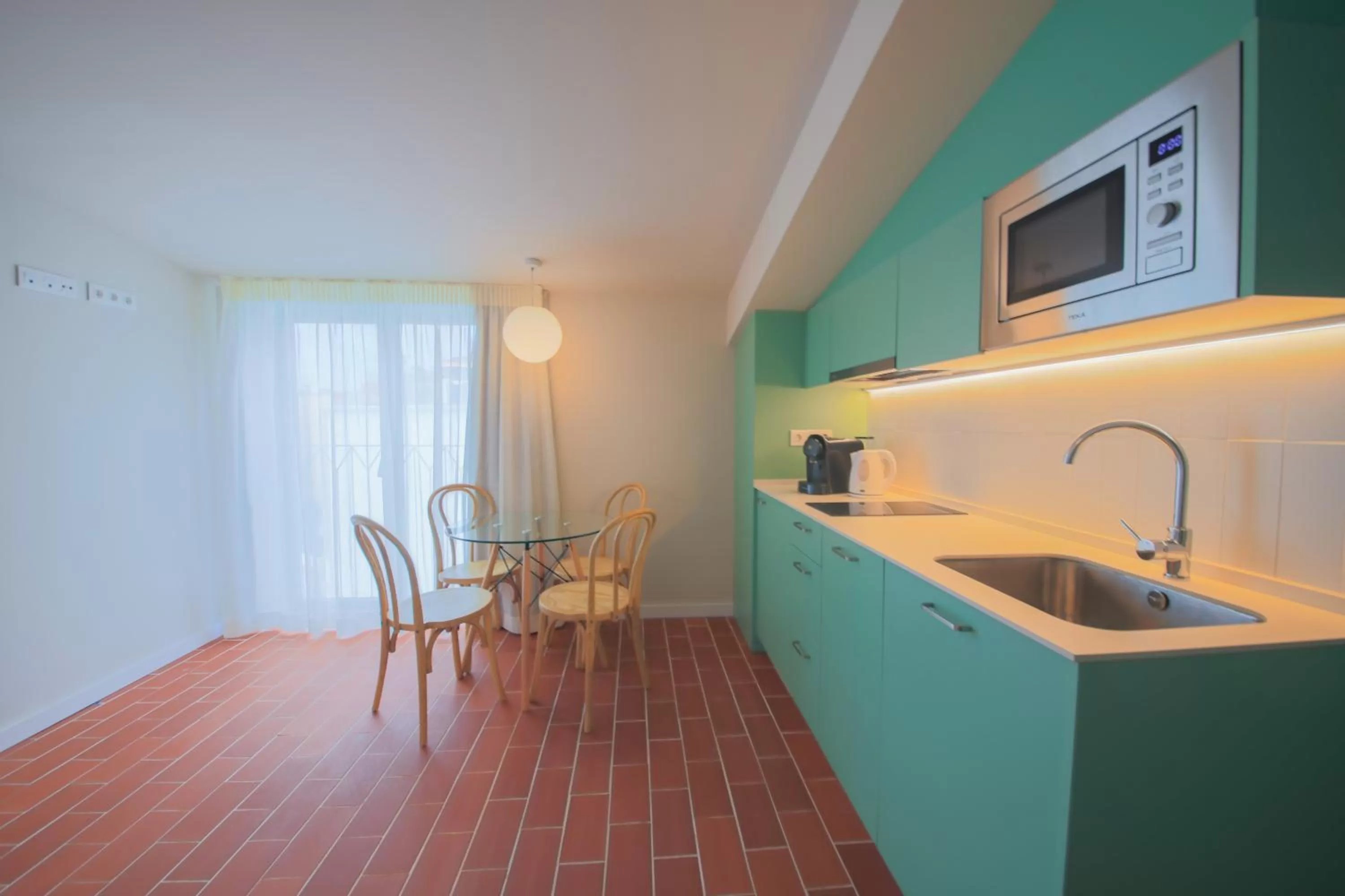 Kitchen or kitchenette in Terra Aurea Aparthotel
