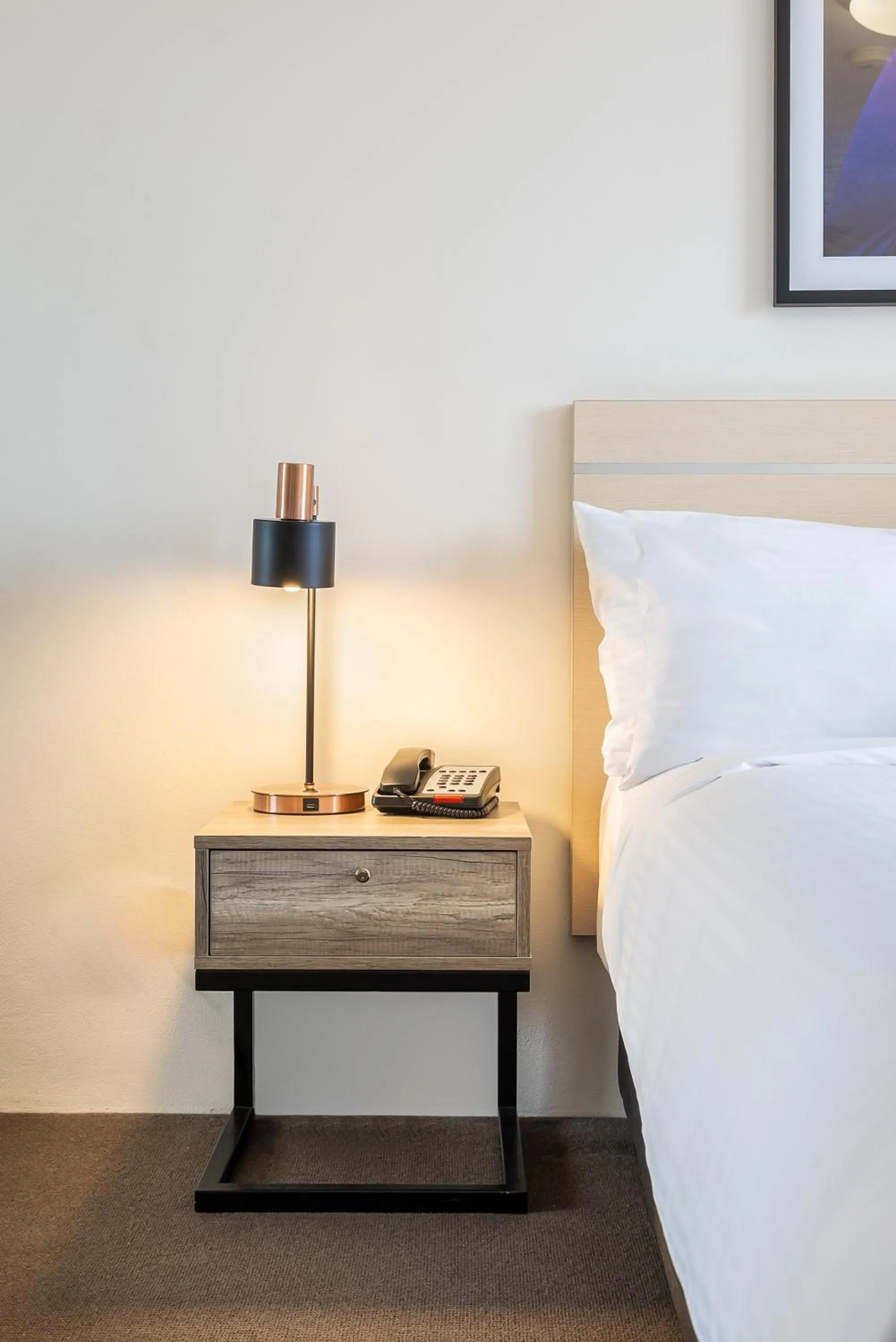 Bed in Oaks Sydney Castlereagh Suites