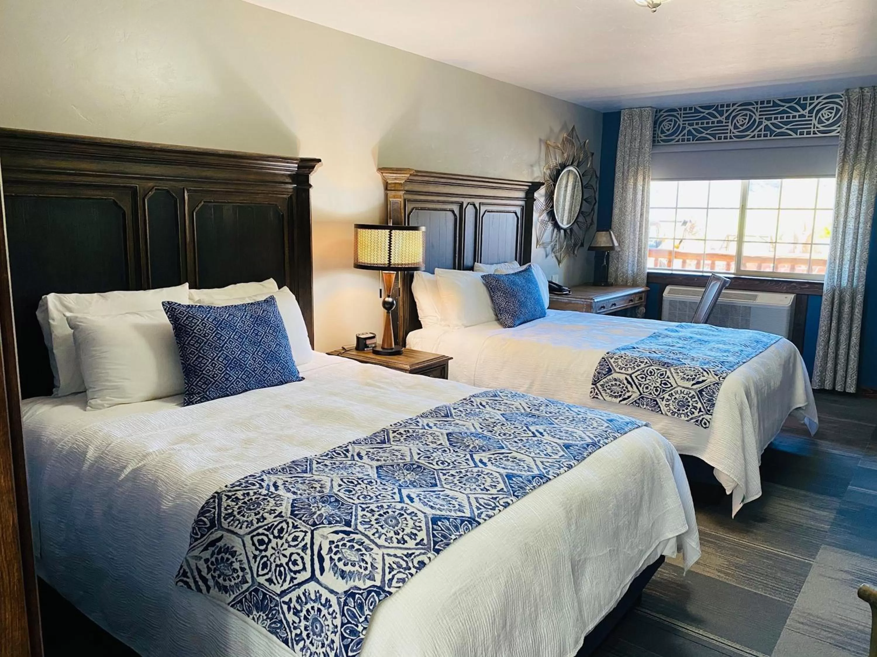 Bed in Desert Rose Resort & Cabins