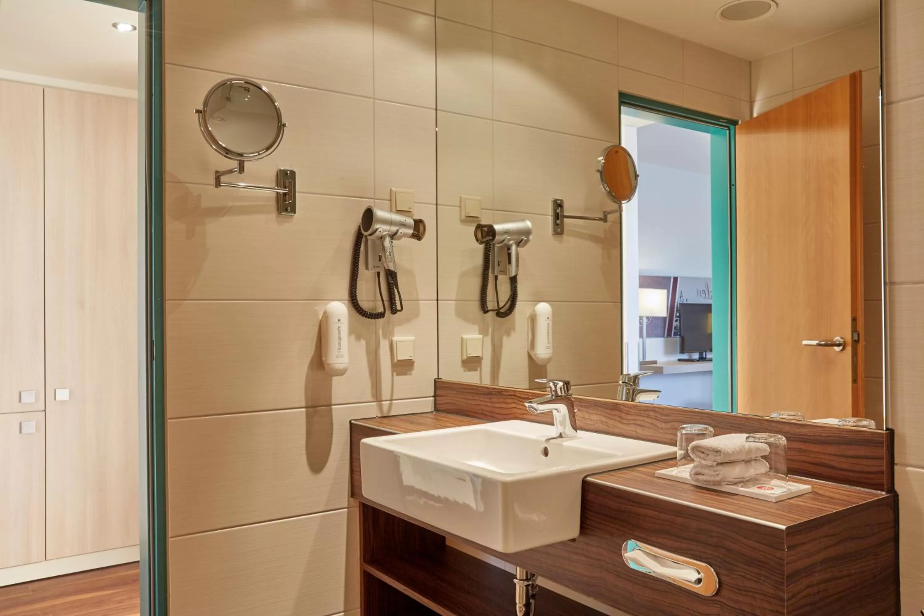 Bathroom in H+ Hotel Limes Thermen Aalen