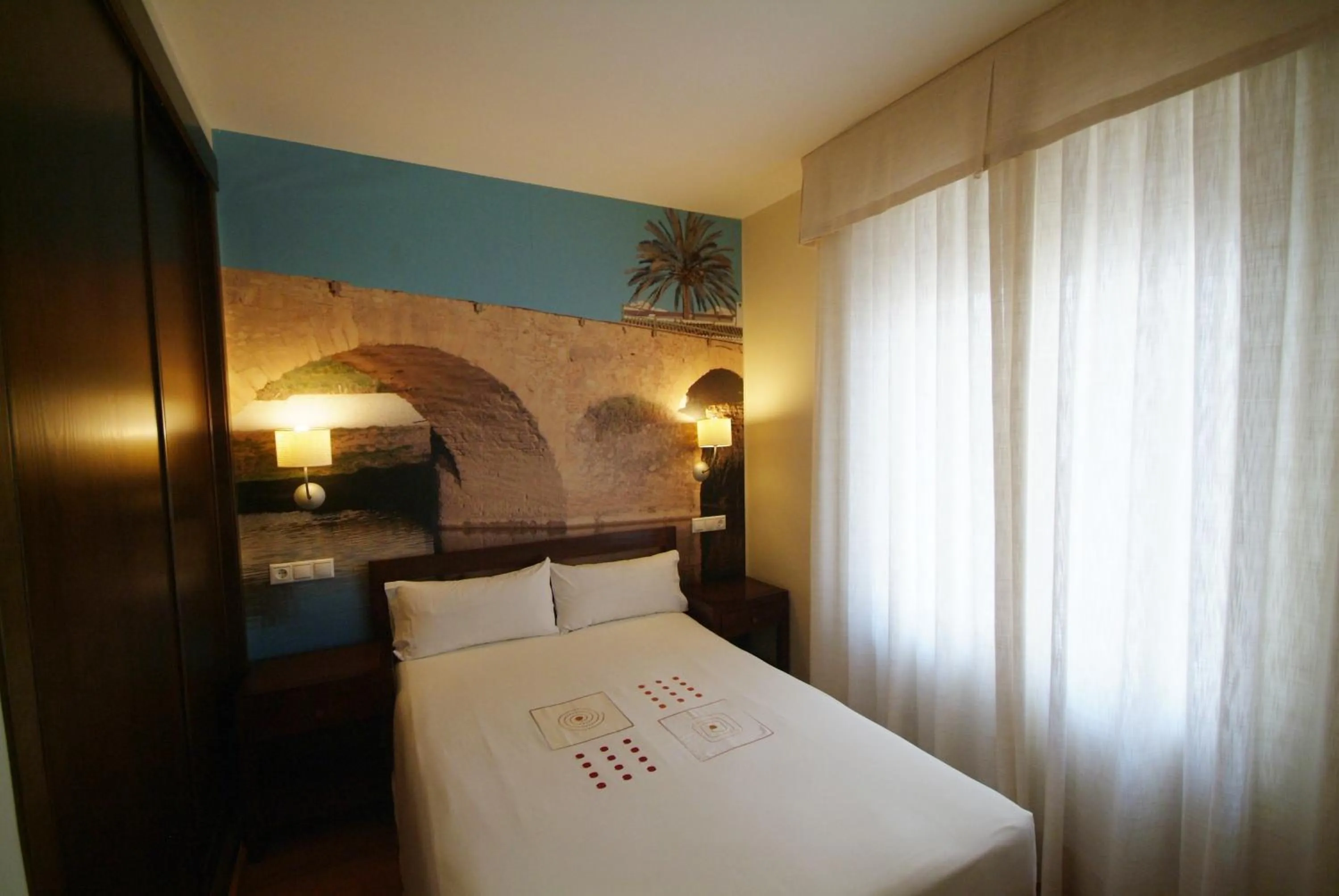 Bedroom, Bed in Apartamentos Ardales