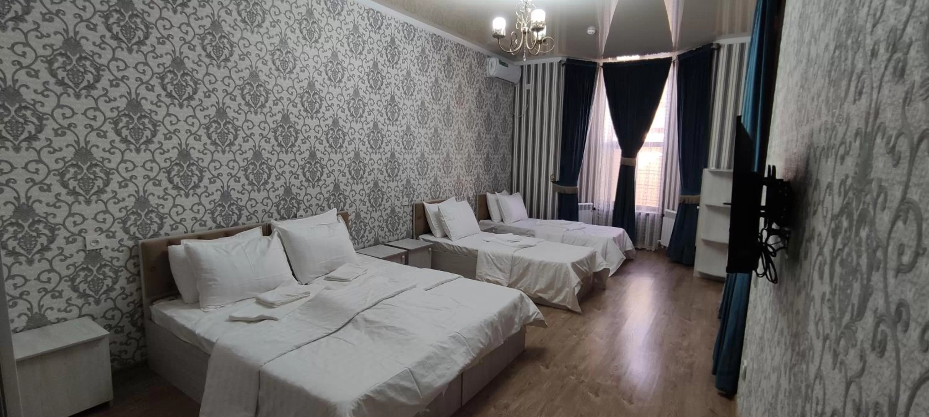 Bed in Aminabonu Hotel