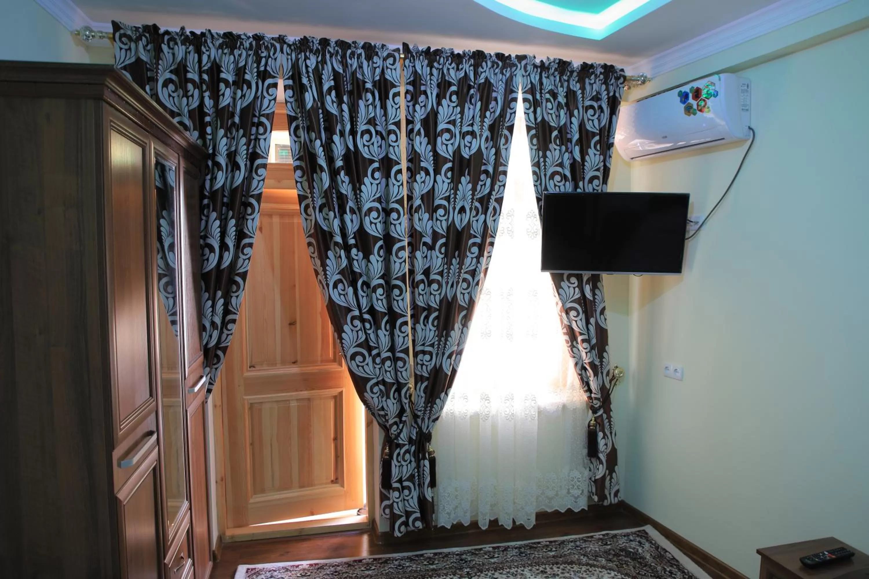 TV/Entertainment Center in Tilyakori Hotel