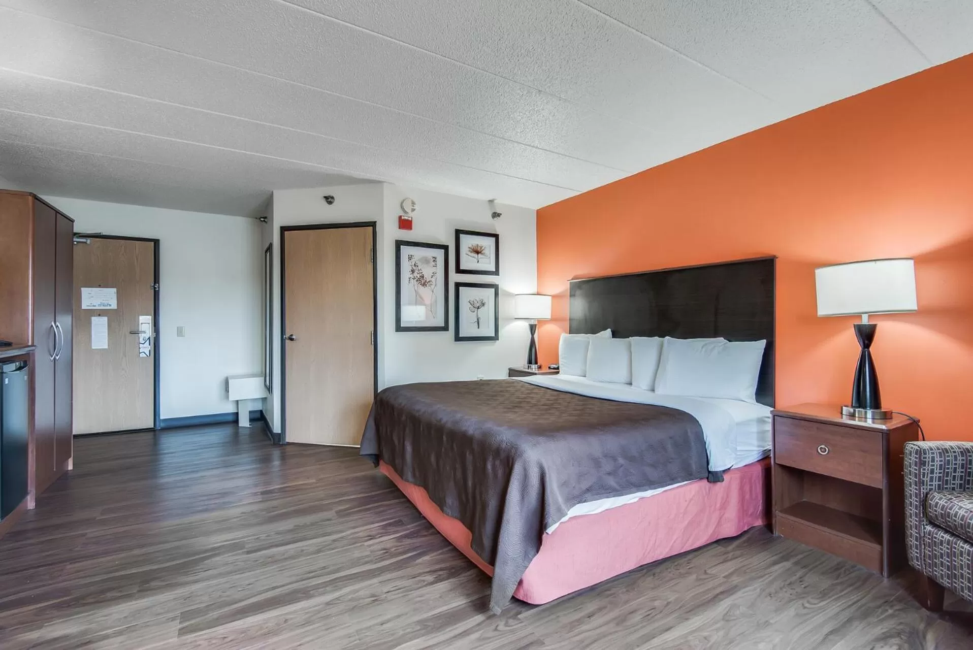 Bed in AmericInn by Wyndham Coon Rapids