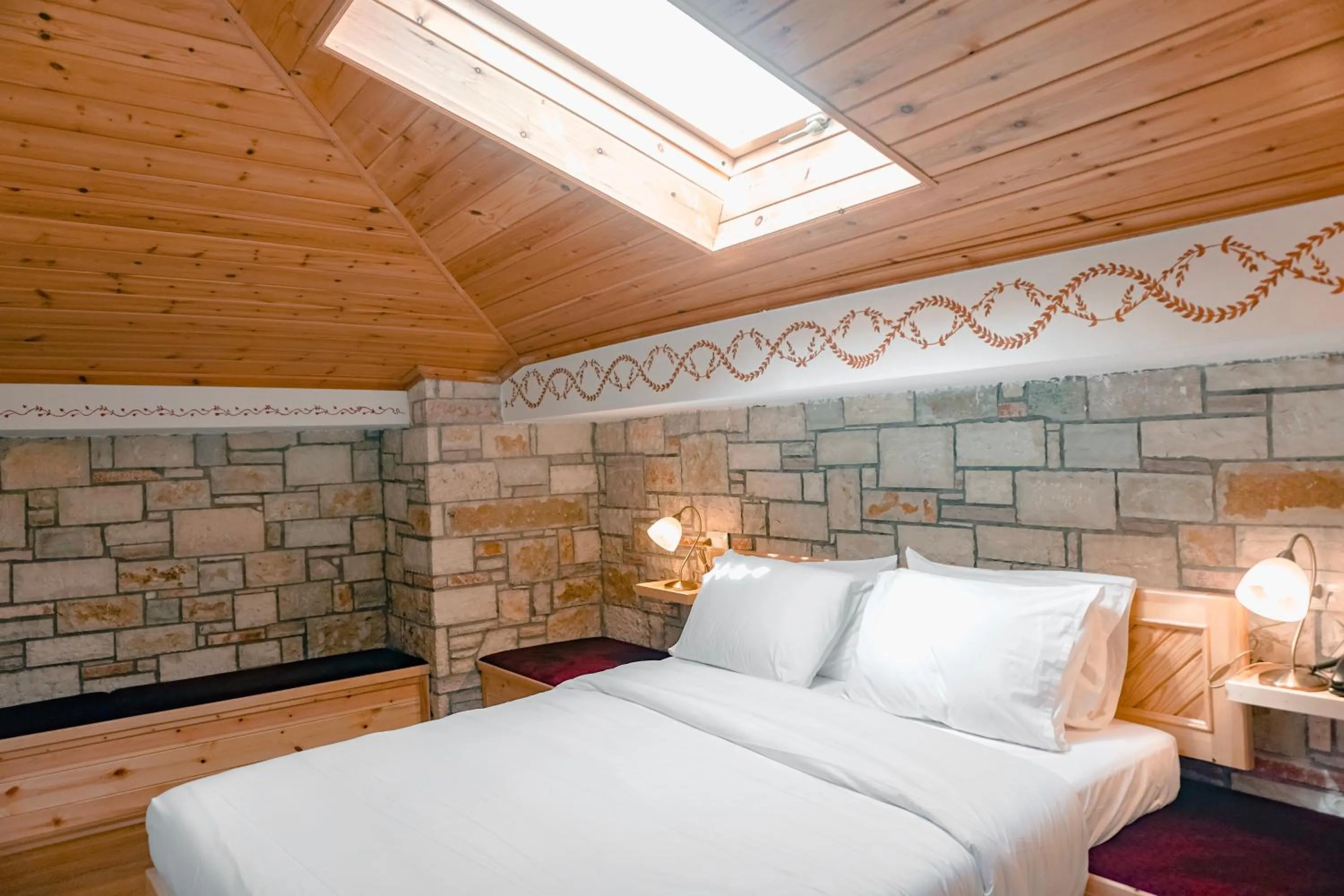 Bed in Hotel Argjiro