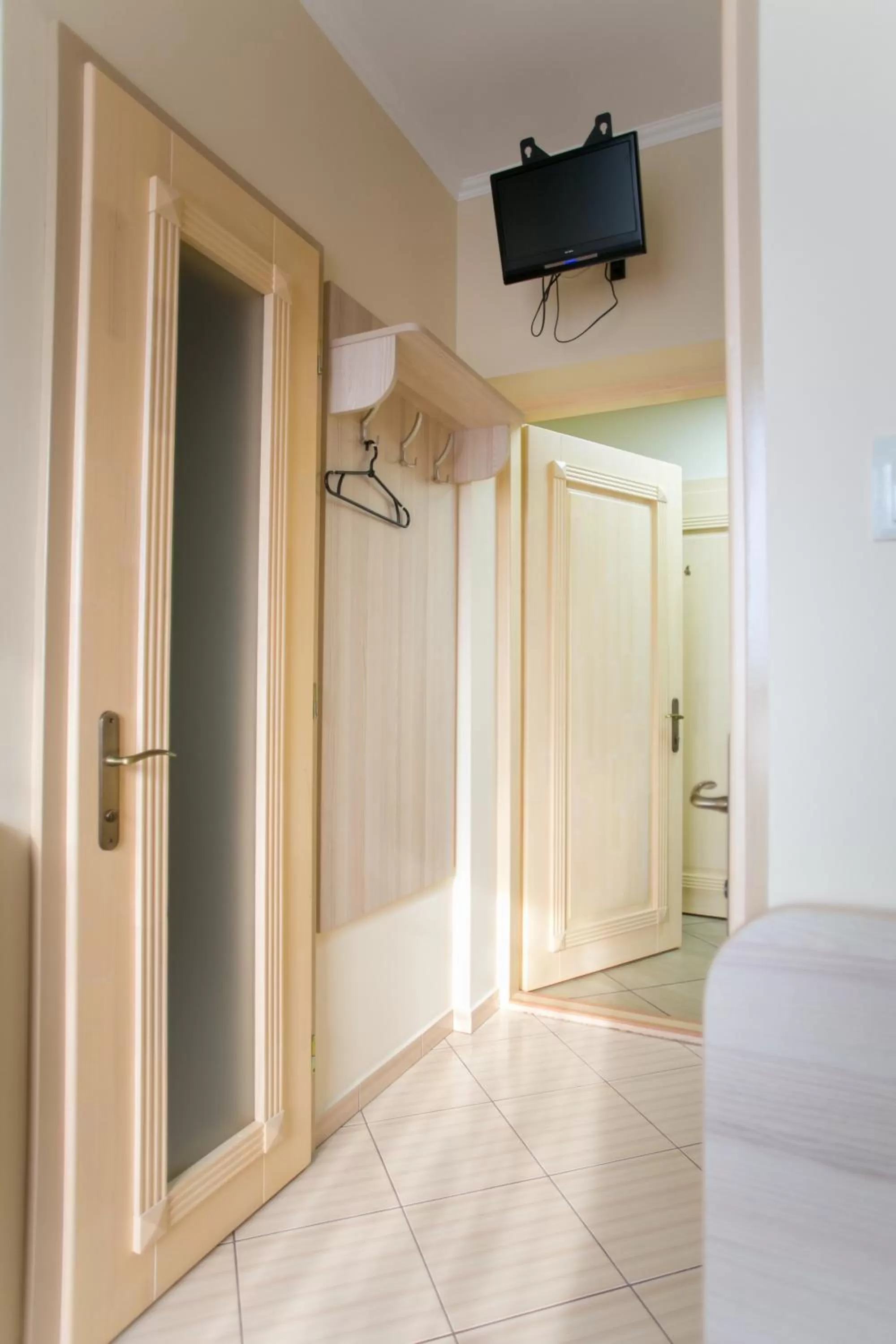 TV/Entertainment Center in Tulipan Hotel Aquapark