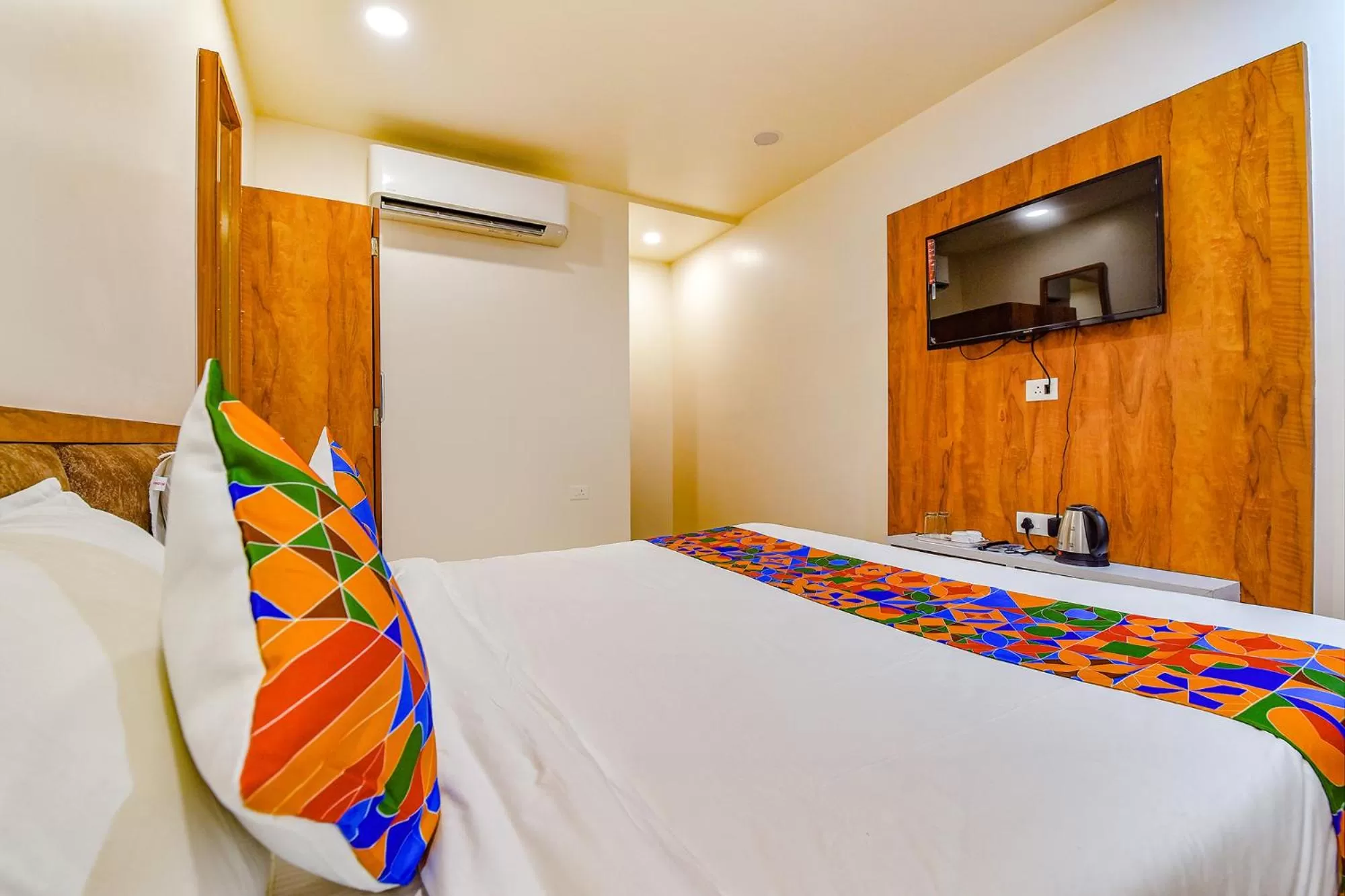 Bed in FabHotel Prime Rudra