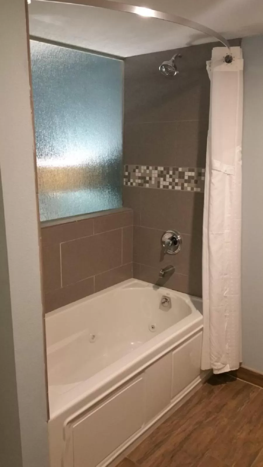 Bathroom in Holiday Inn Harrisburg East by IHG