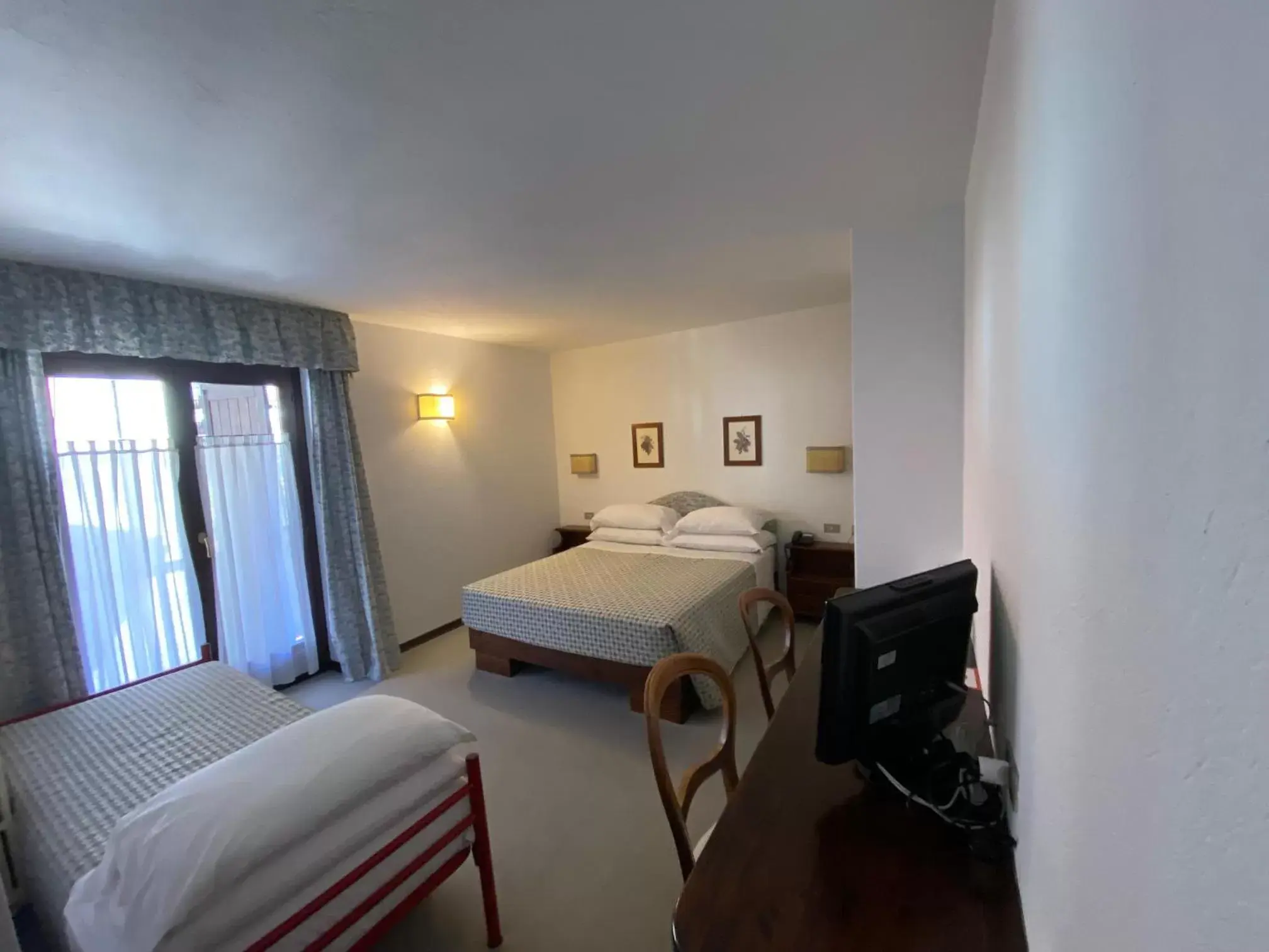 Triple Room in Hotel Triolet Triple Room in Hotel Triolet