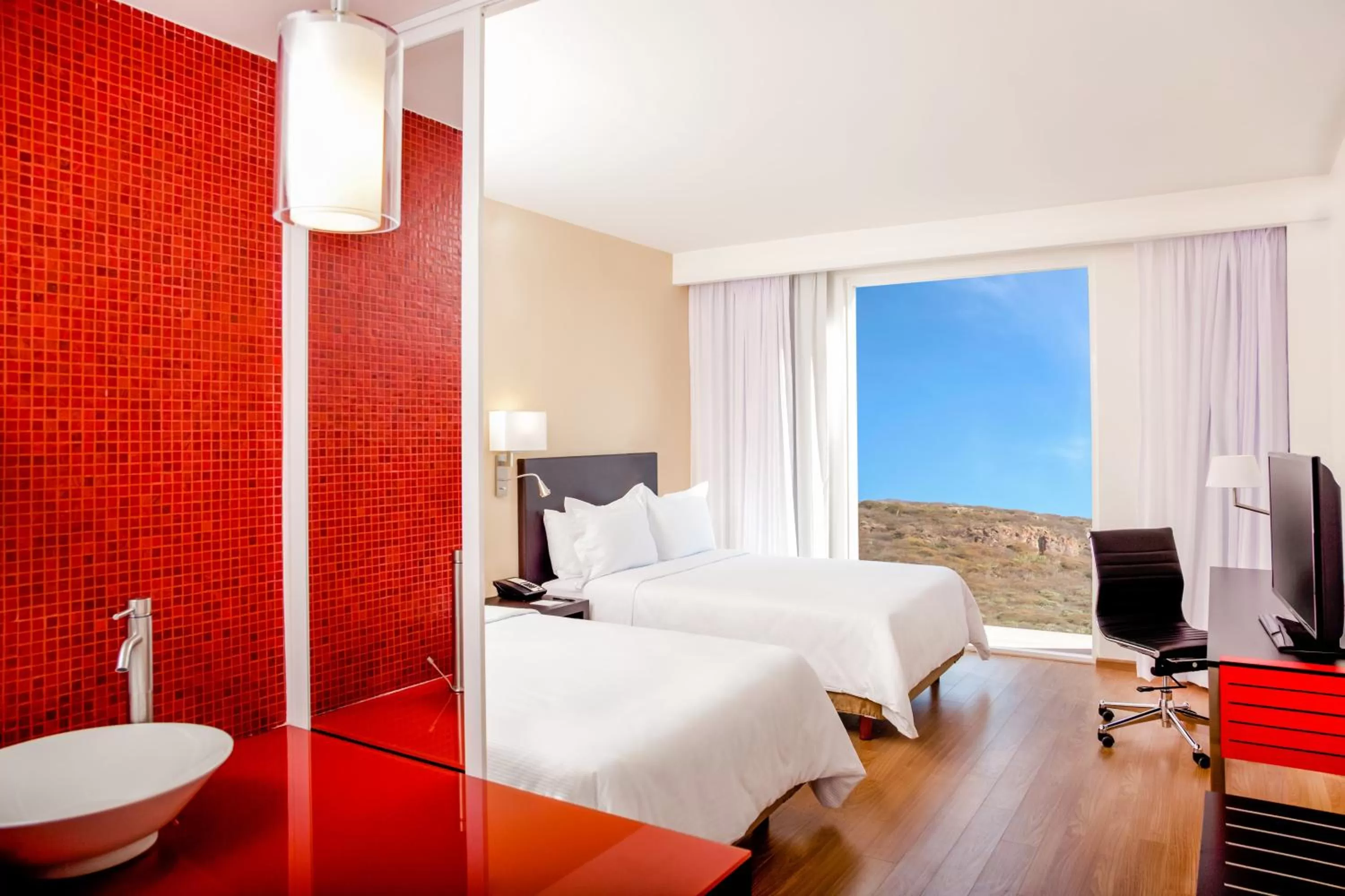 Photo of the whole room, Bed in Fiesta Inn Queretaro Centro Sur