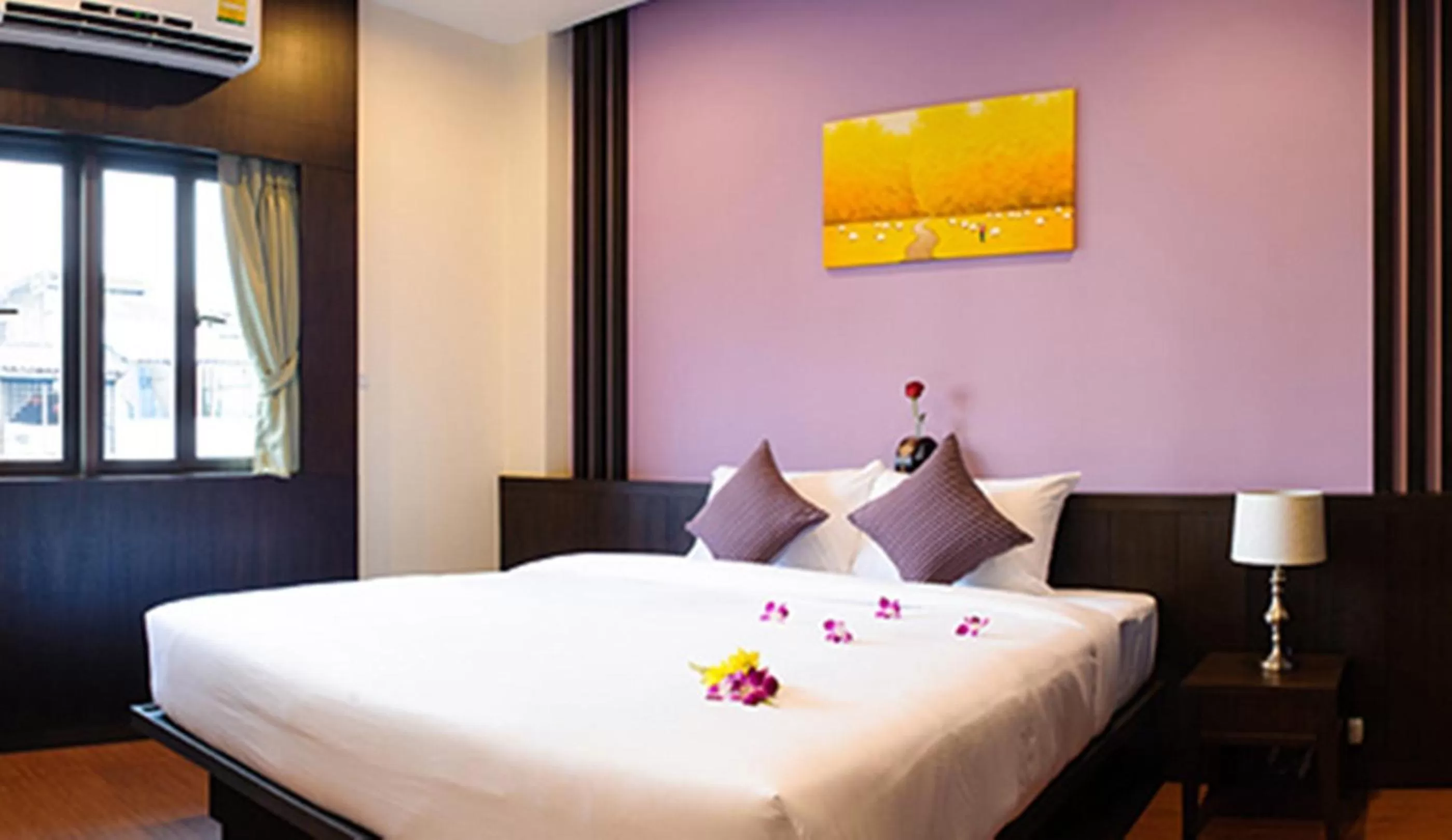 Bed in Tara Place Hotel Bangkok