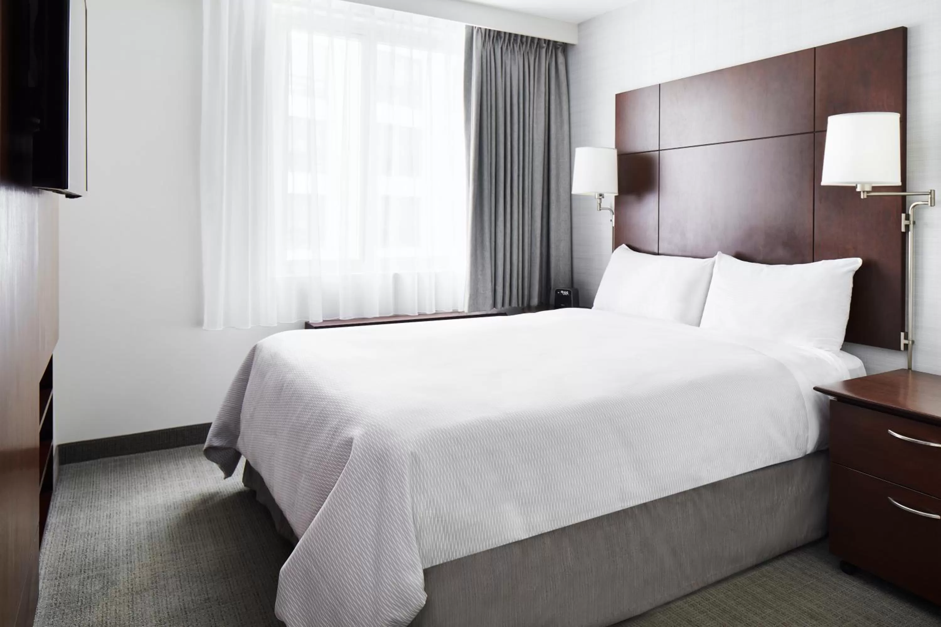 Bed in Club Quarters Hotel Embarcadero, San Francisco