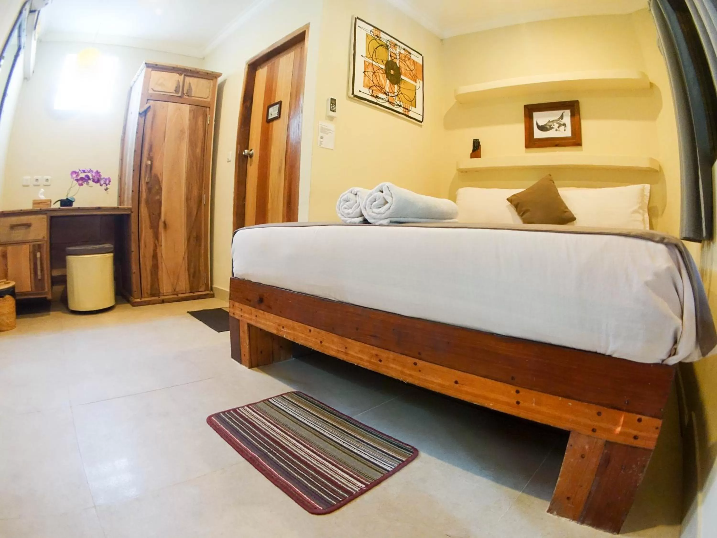 Photo of the whole room, Bed in Gili Divers Hotel