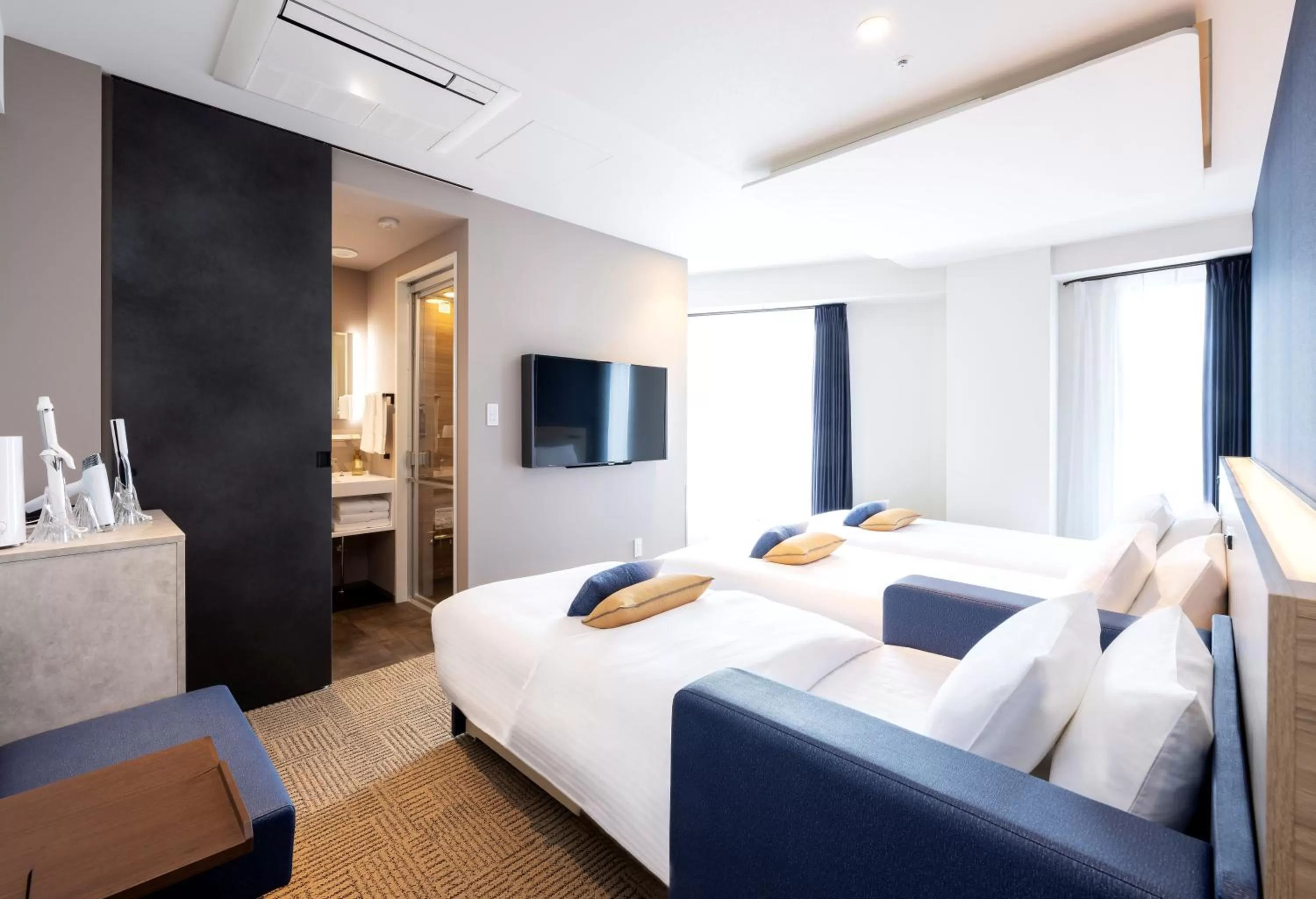 Photo of the whole room, Bed in HOTEL AMANEK Shinjuku Kabukicho