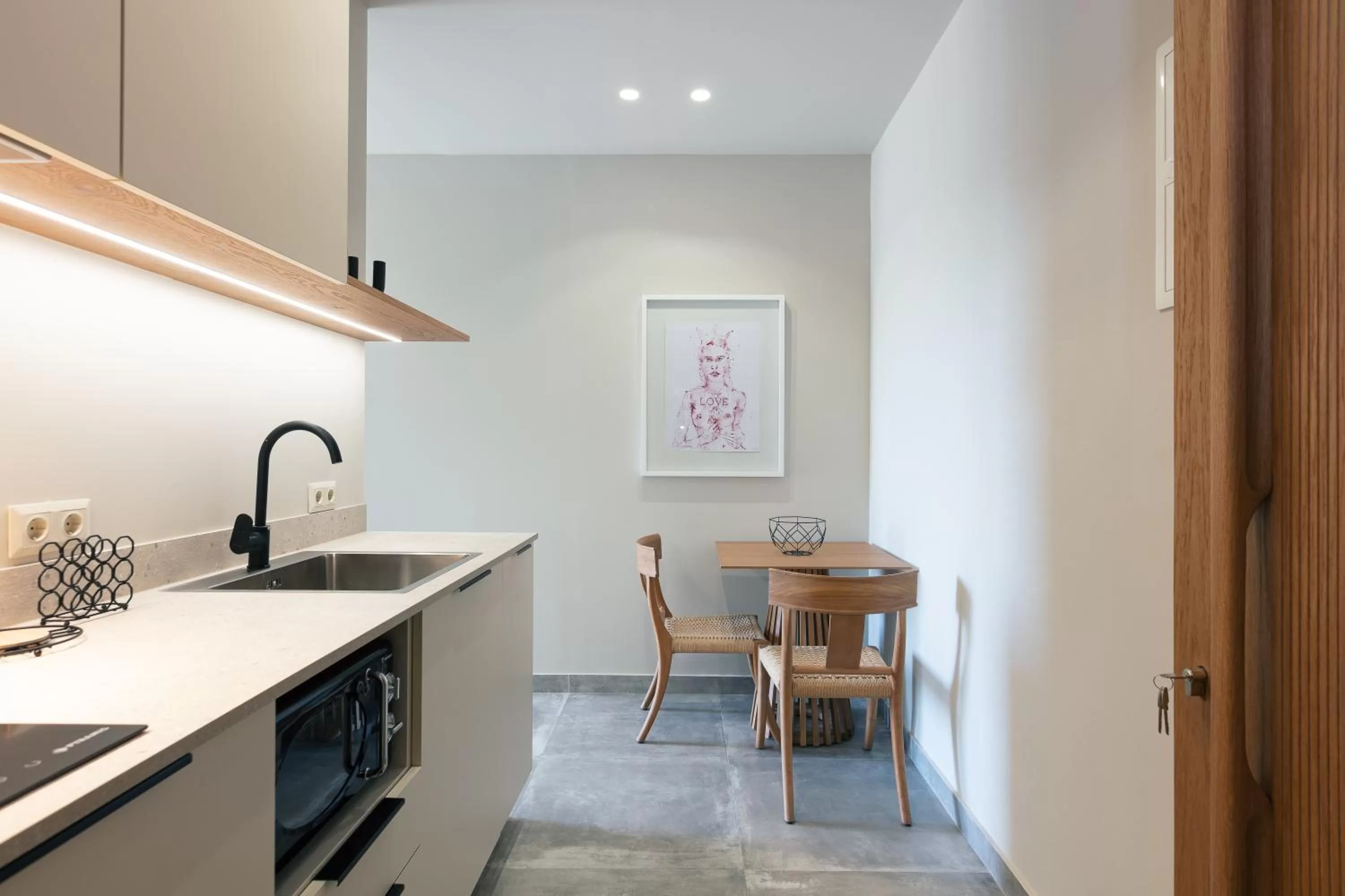 Kitchen or kitchenette in Chapter 02 Gallery Suites