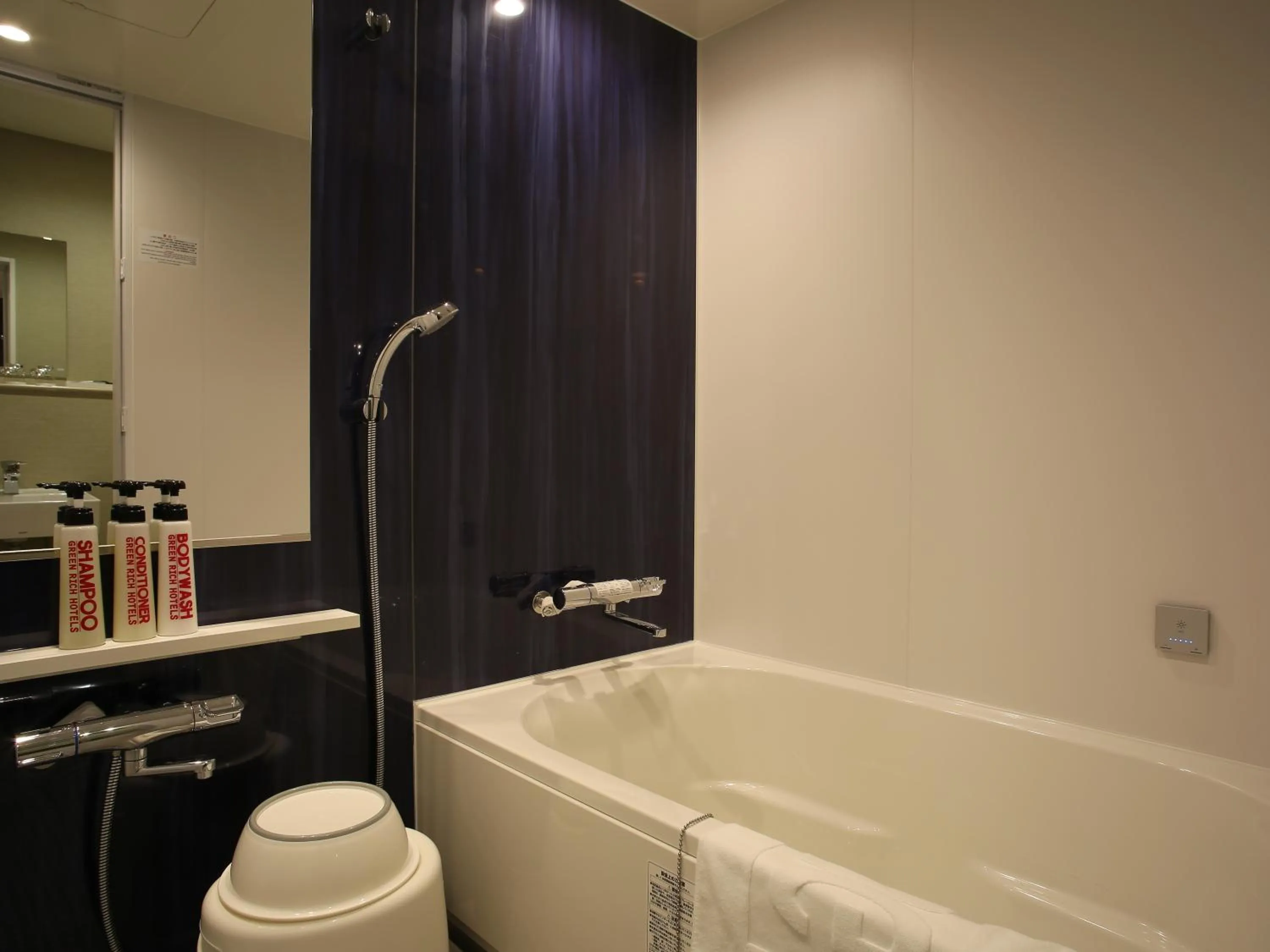 Bathroom in Green Rich Hotel & Capsule Naha - Artificial hot spring Futamata Yunohana