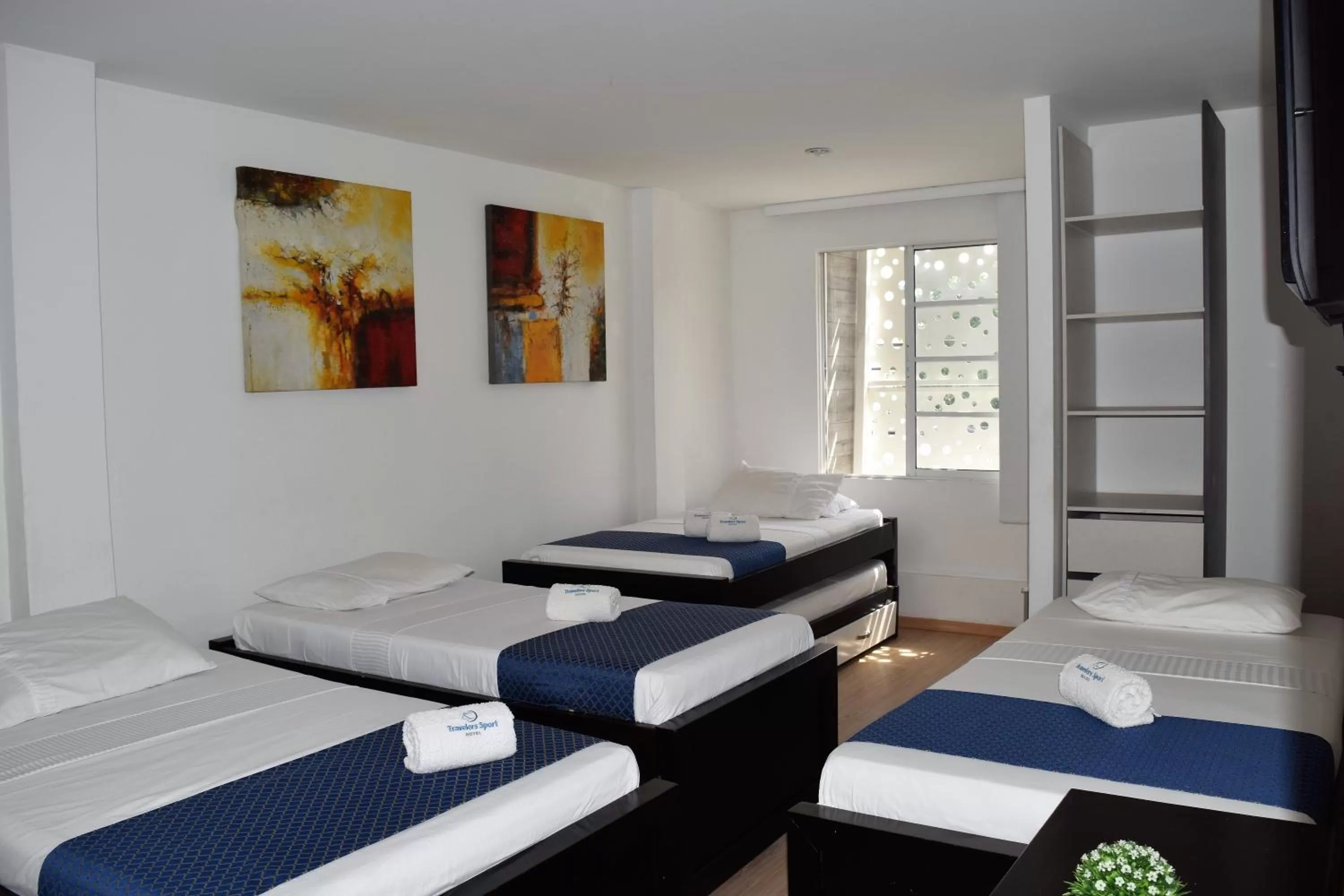 Family, Bed in Hotel Travelers Sport