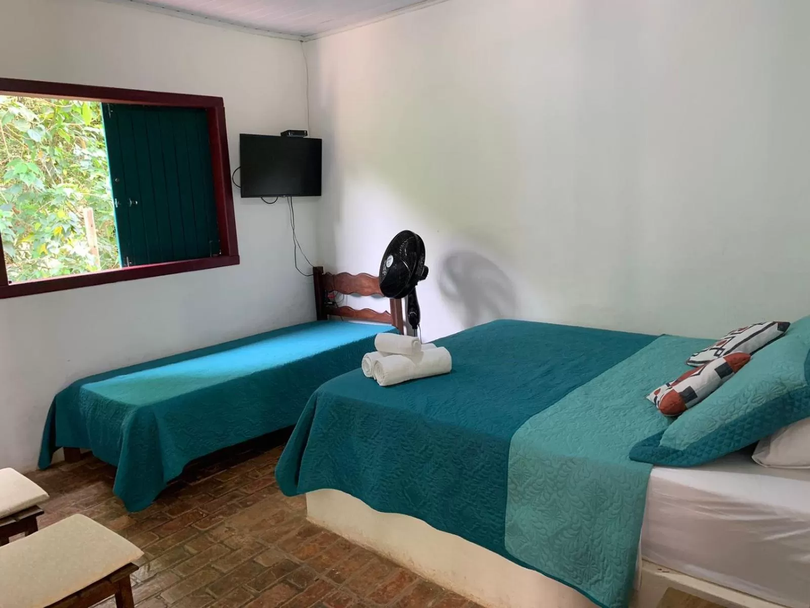 Bed in Pousada Cantinho do Mundo