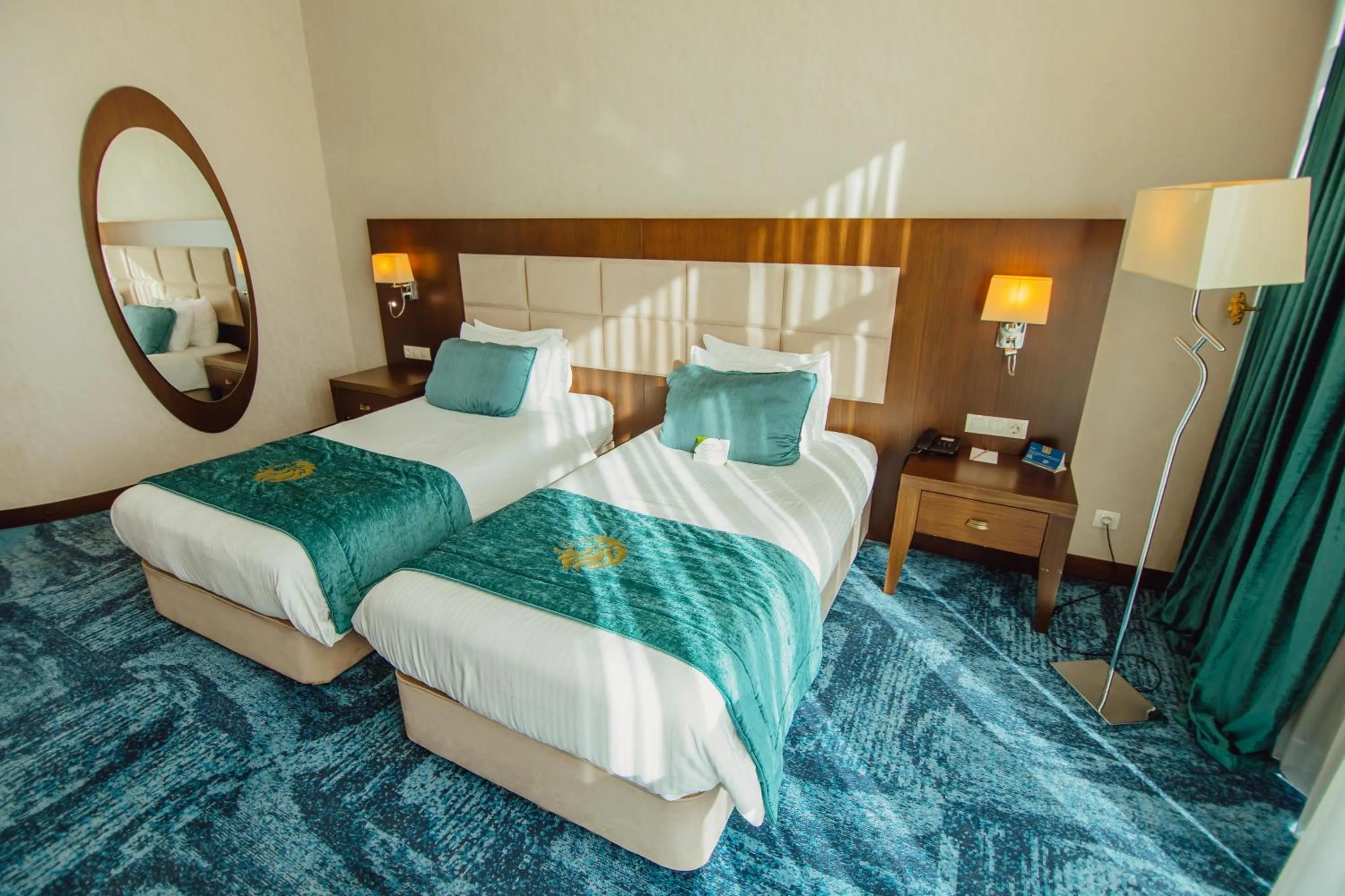 Bed in JRW Welmond Hotel