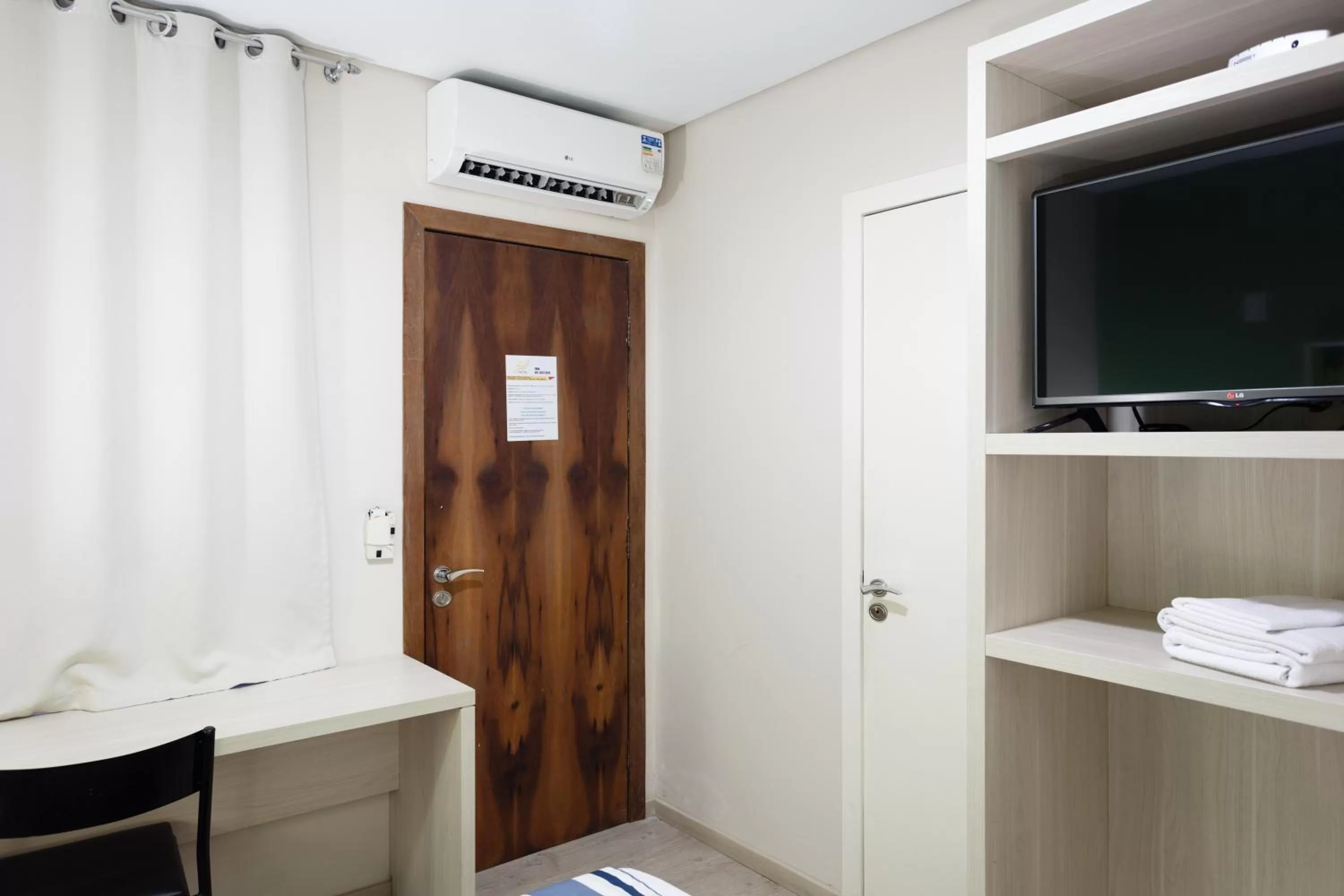 TV/Entertainment Center in Hotel Sol By MRHotelaria