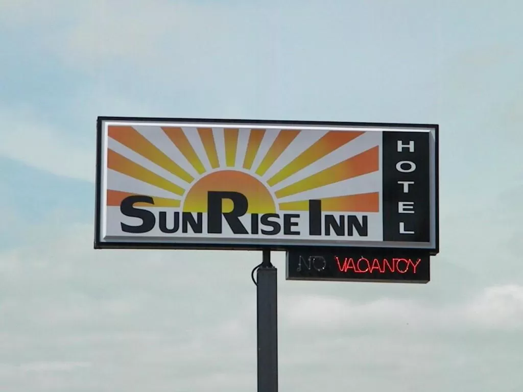 Property logo or sign in SunRise Inn Hotel
