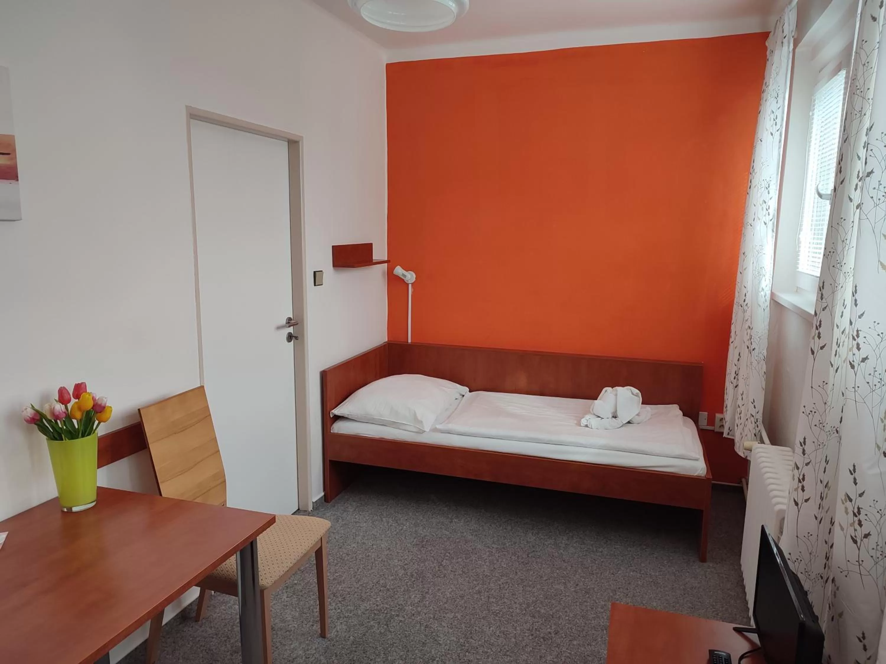Bed in BEST Hotel Garni