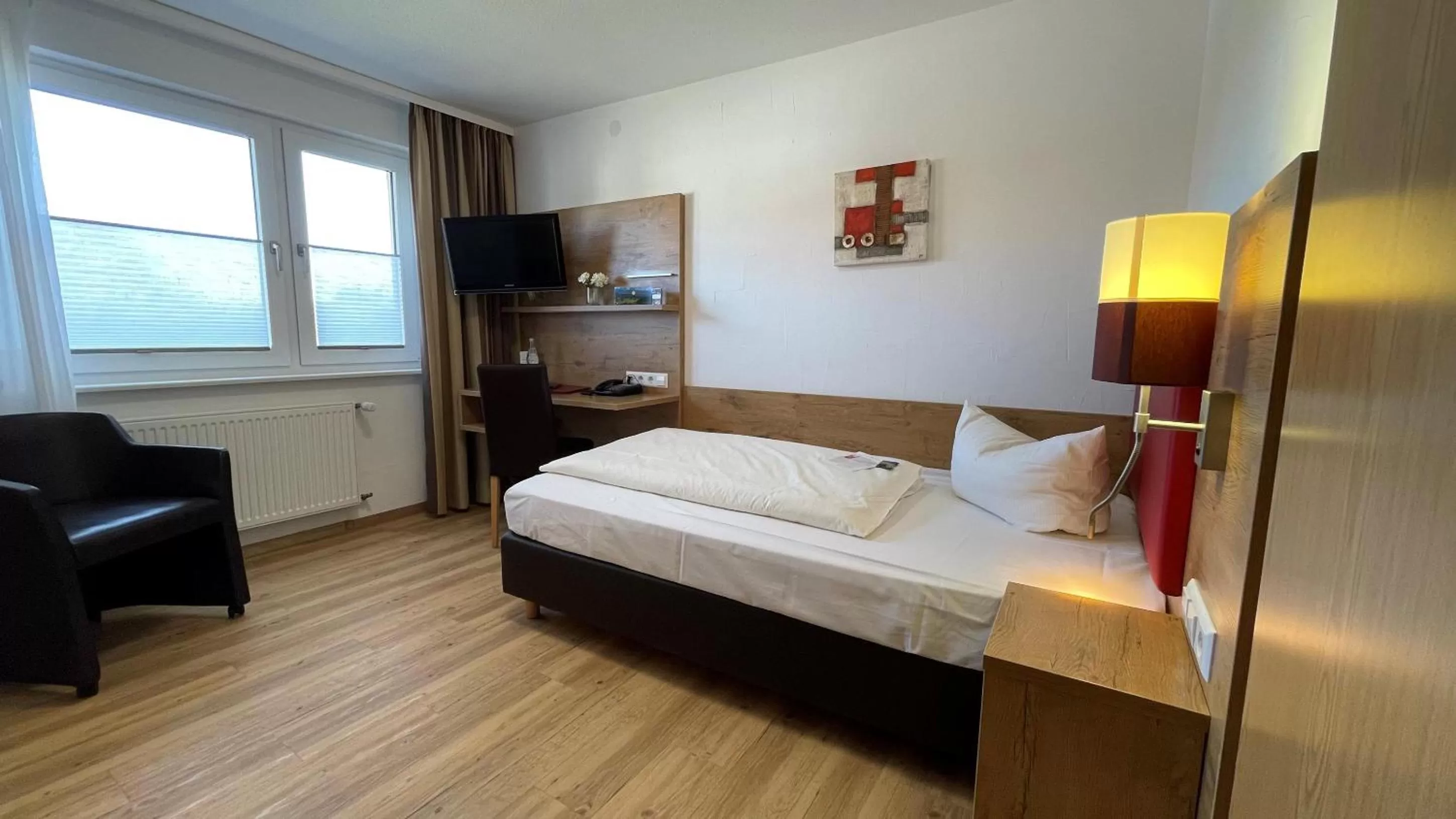 Photo of the whole room, Bed in Wellnesshotel Sonnenhof & Sonnhalde