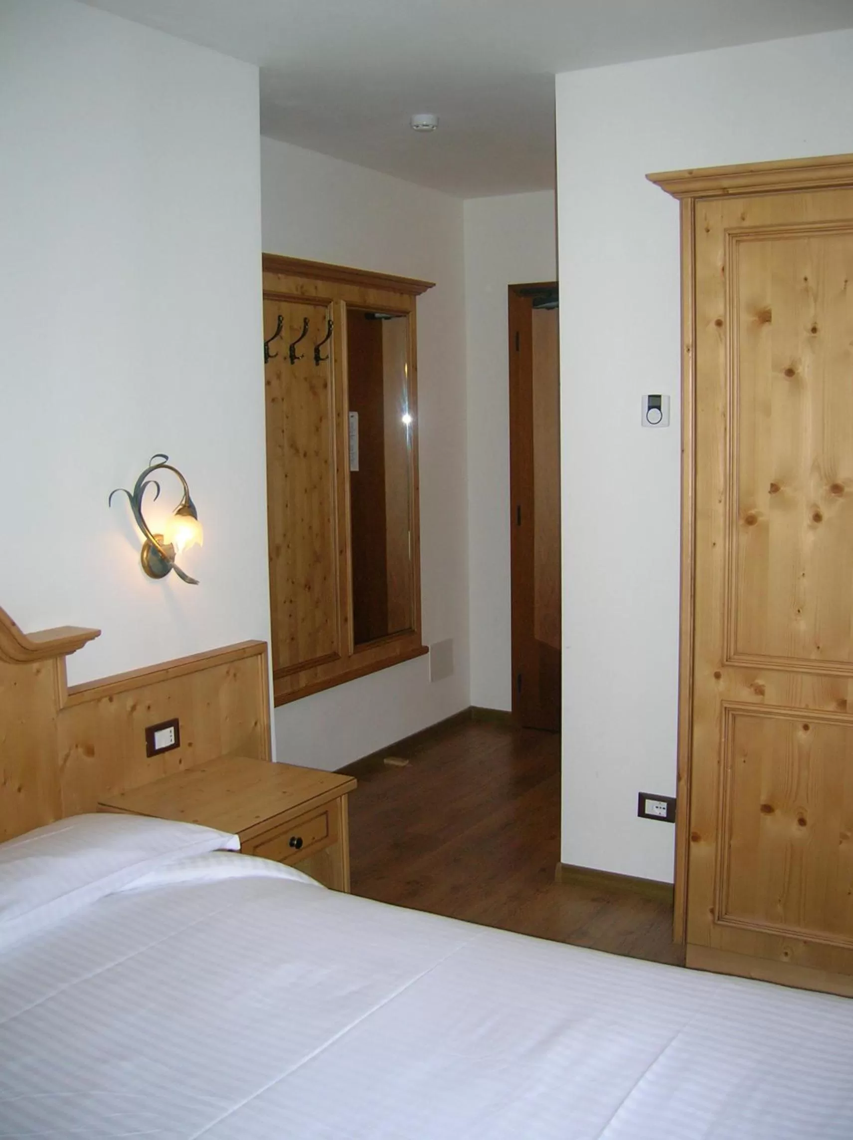 Decorative detail, Bed in Hotel Villa Fosine Spa & Wellness