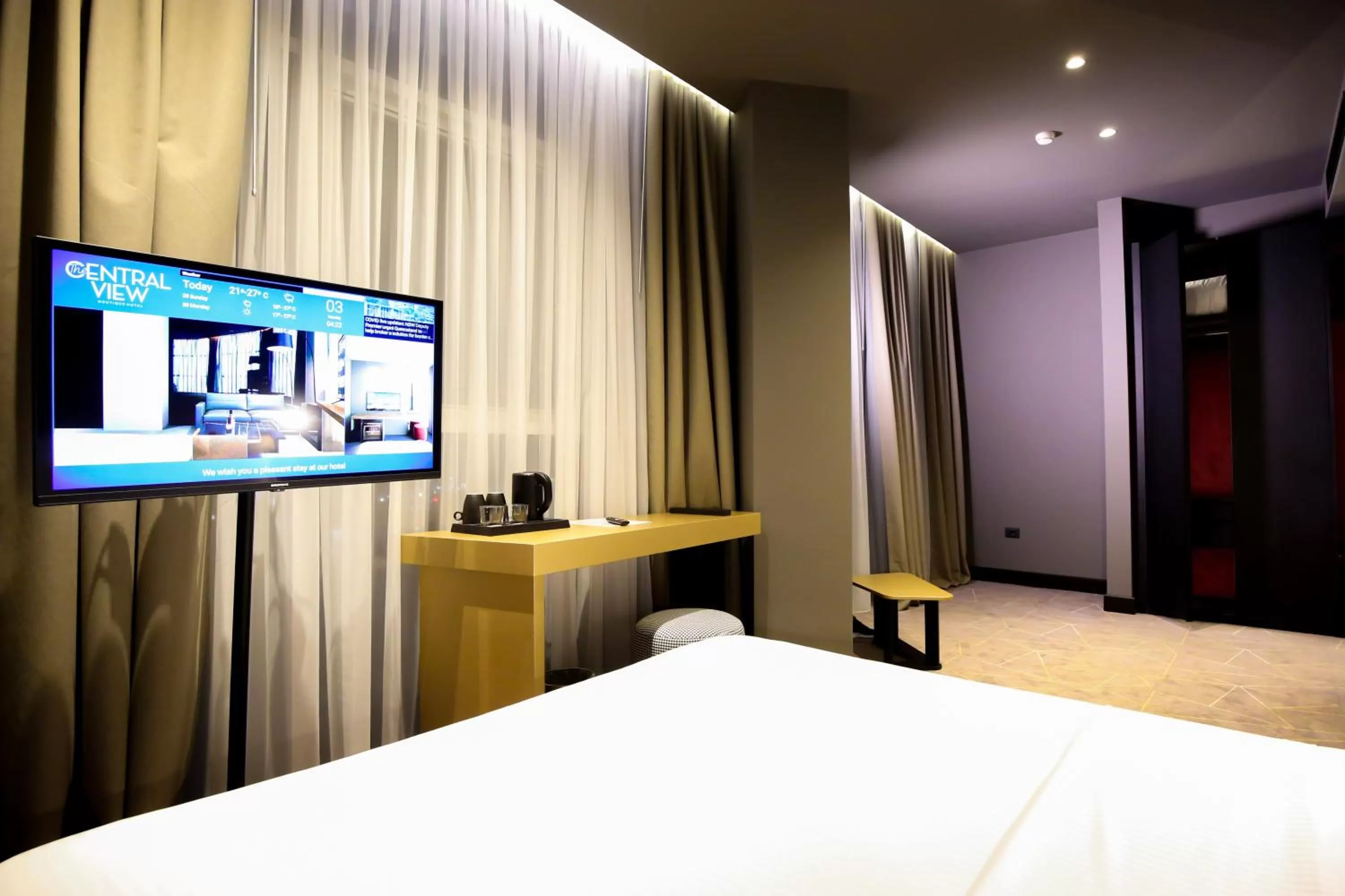 Bed in The Central View Boutique Hotel