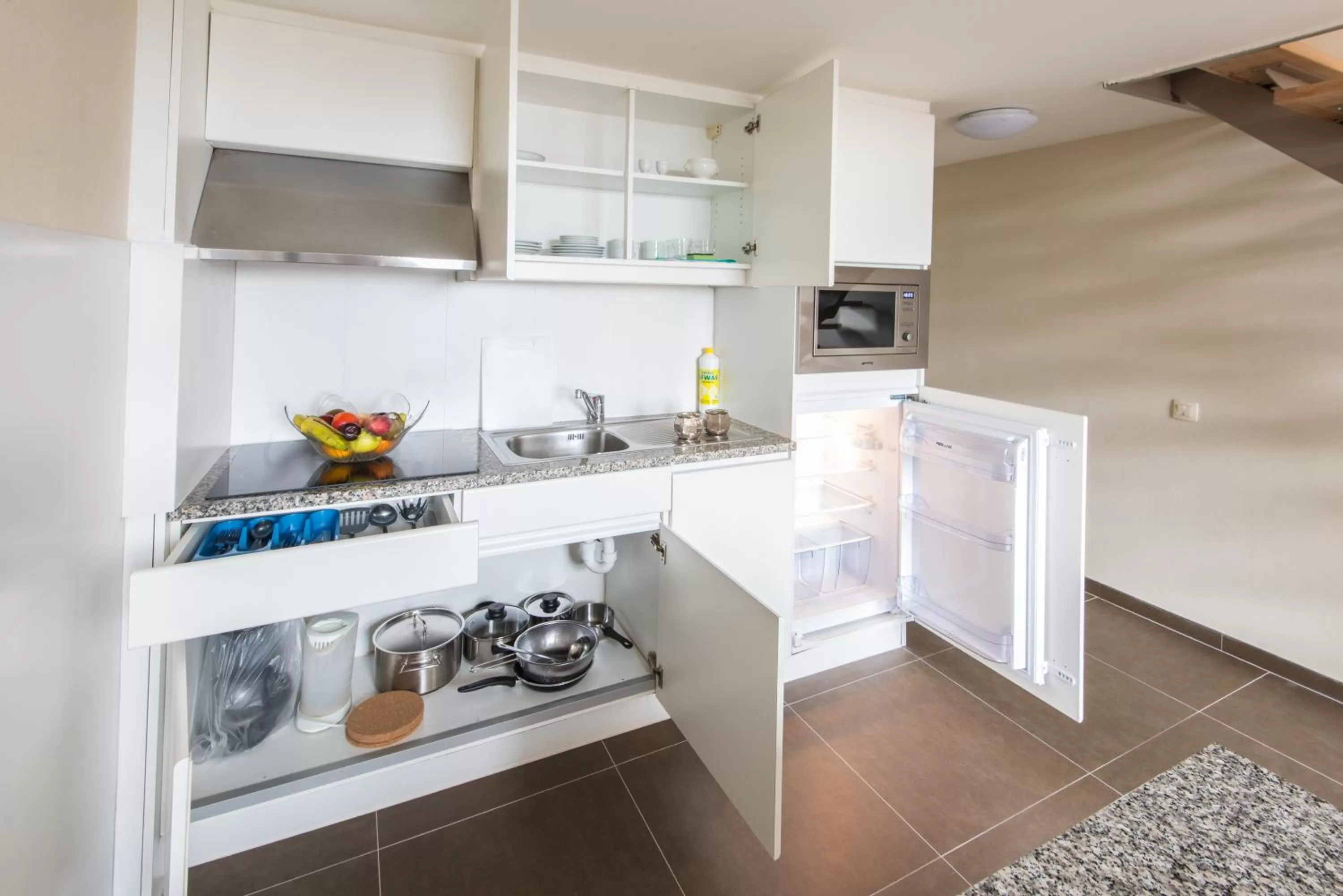 Kitchen or kitchenette in Arass Hôtel & Business Flats