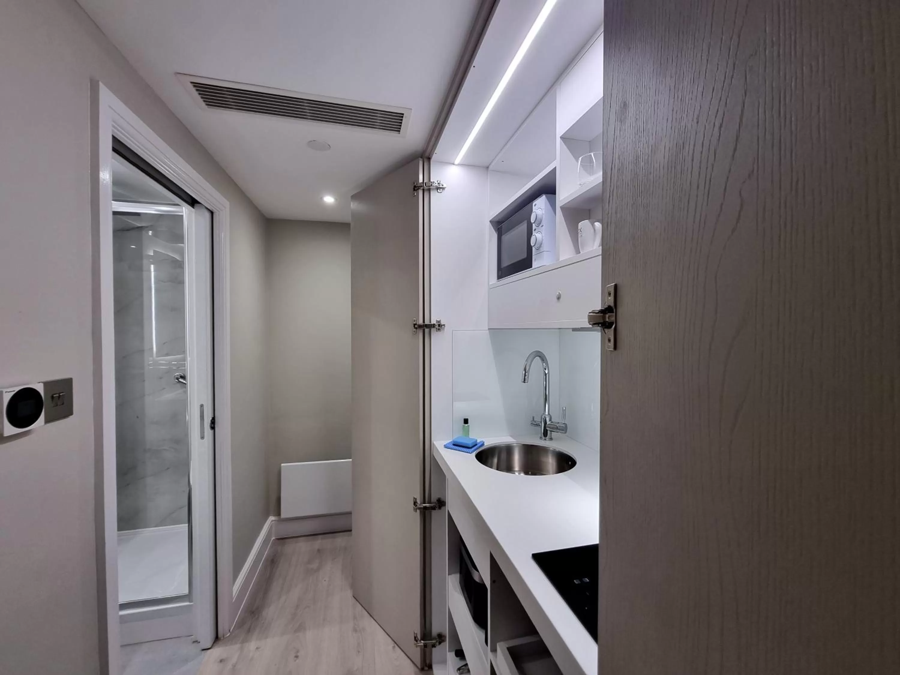 Kitchen or kitchenette in NOX Kensington Gardens