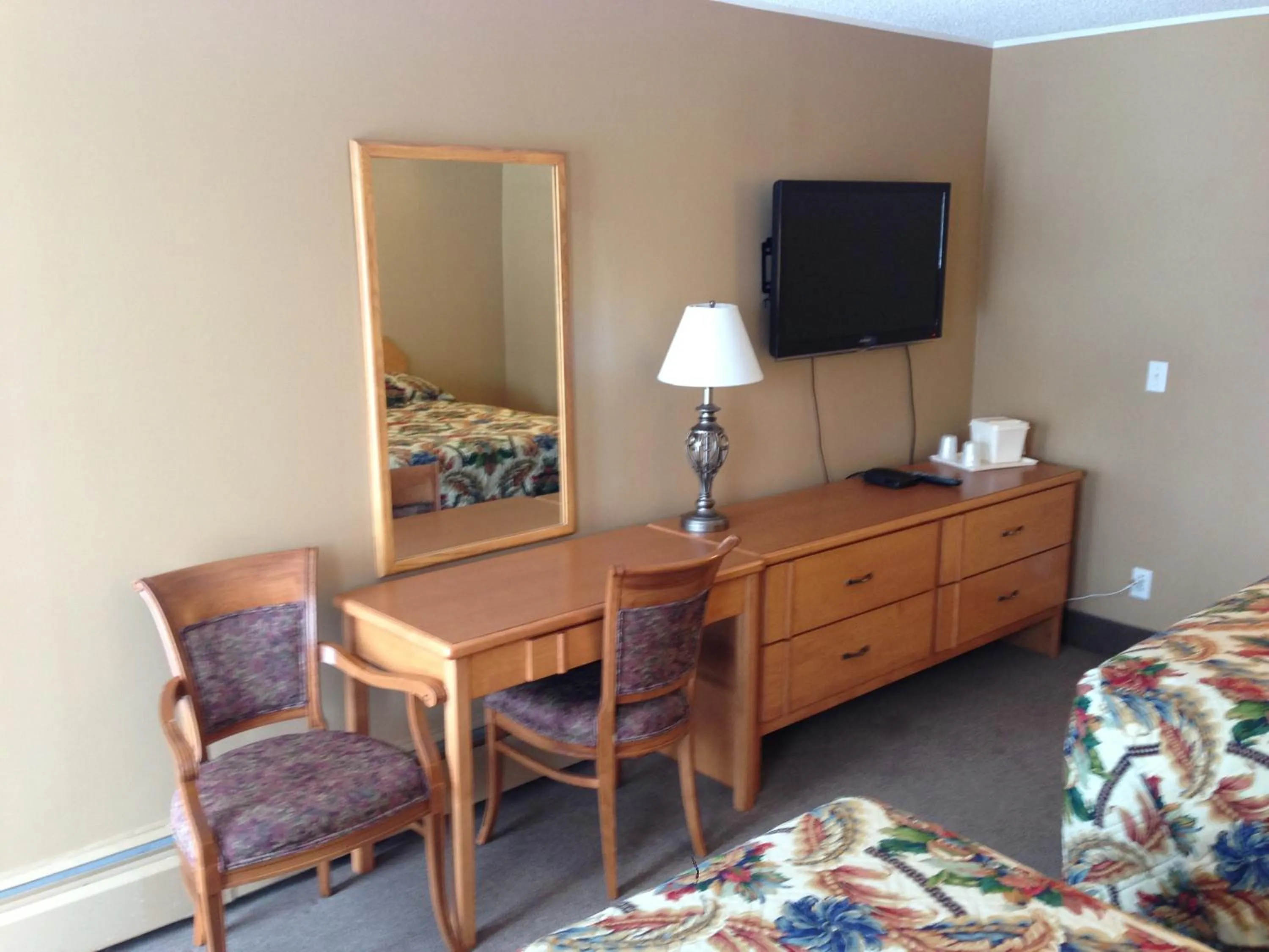 Queen Room with Two Queen Beds - Smoking in Travelodge by Wyndham Moose Jaw