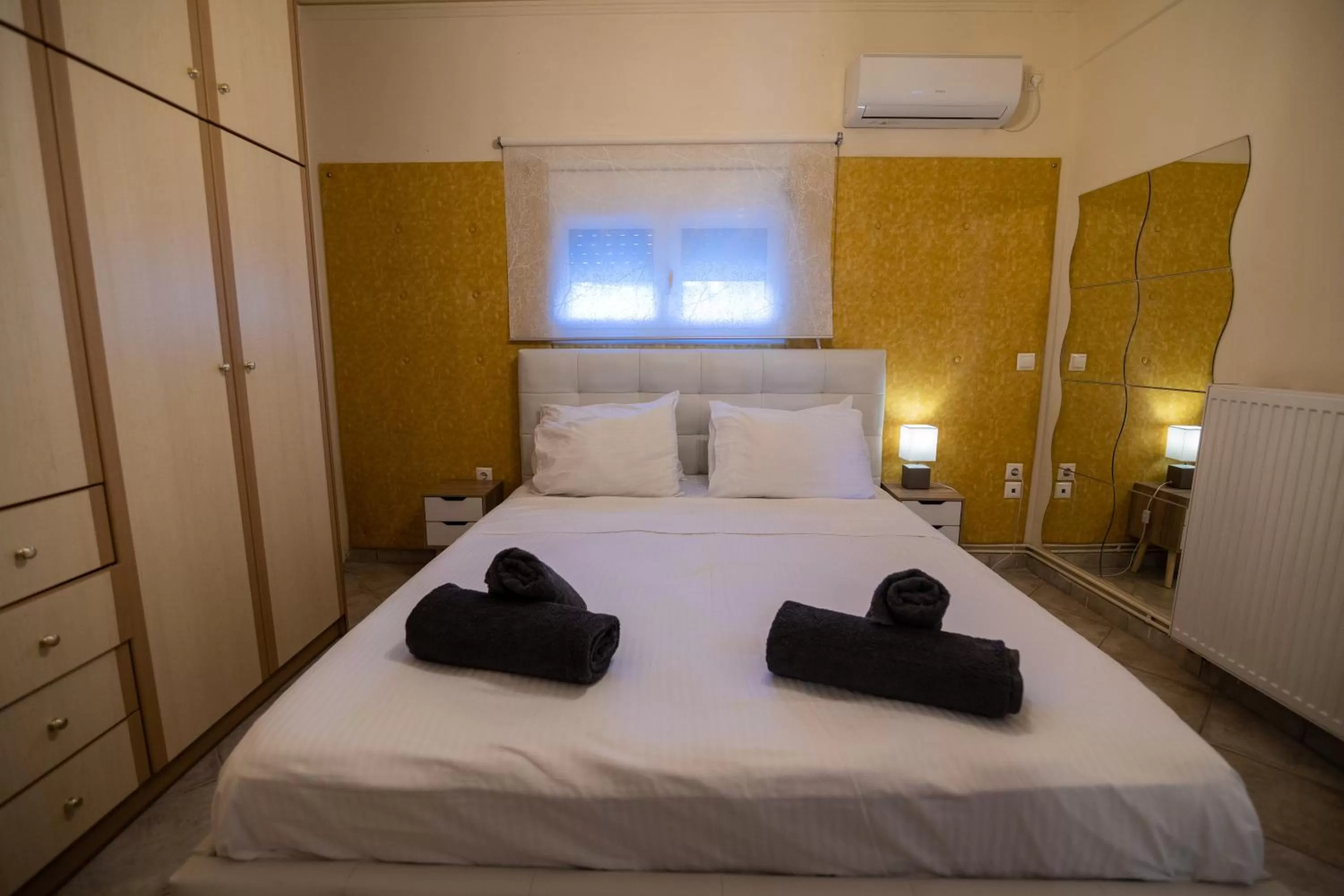 Bed in Votsalakia Hotel & Luxury Apartments