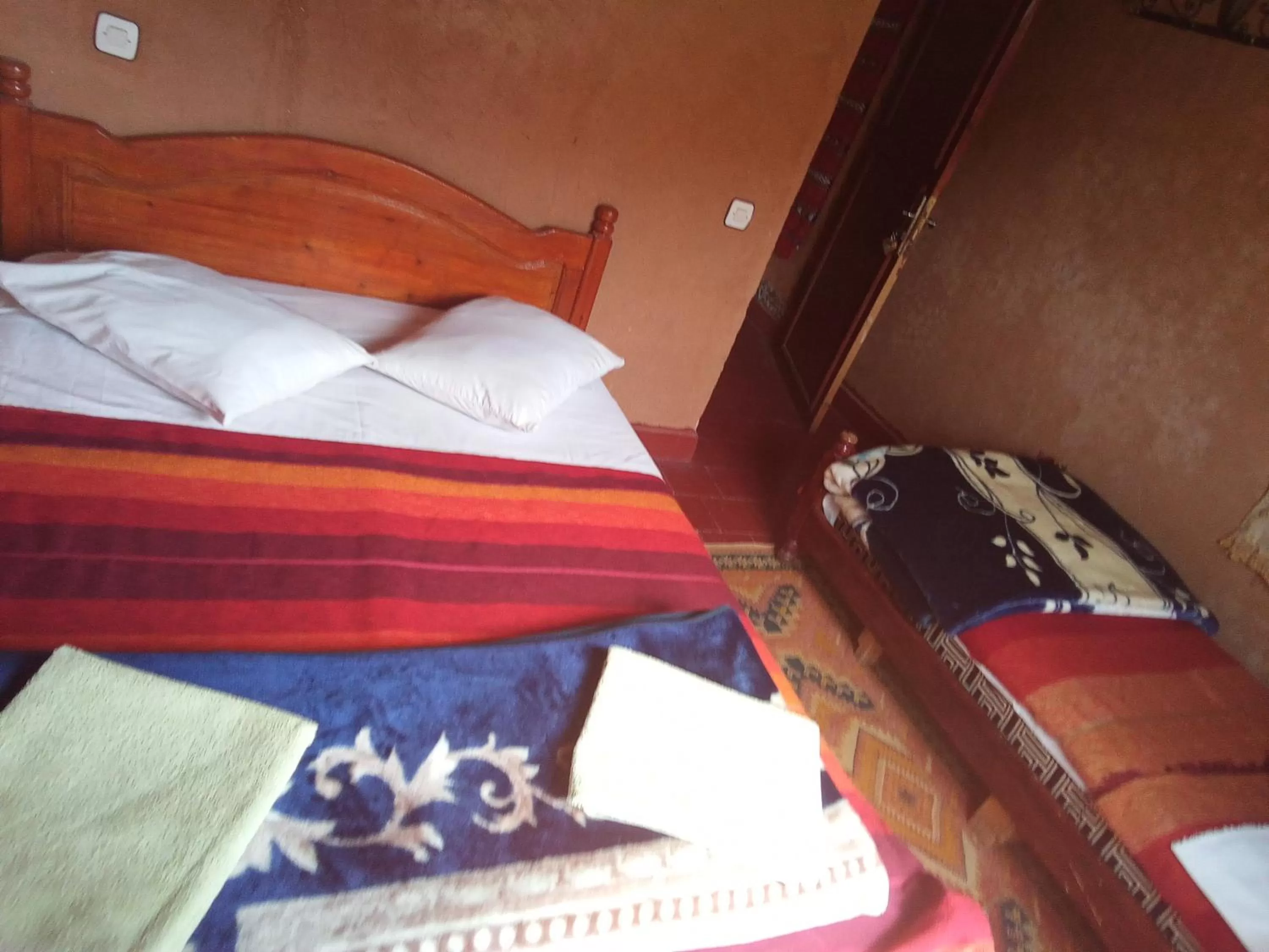 Bed in Maison d'Hôte Valentine