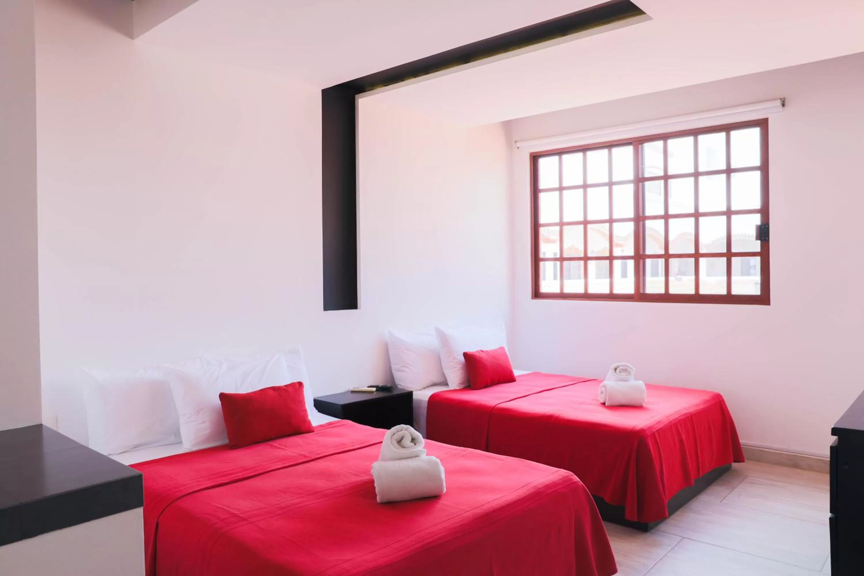 Bed in Hotel Colonial Playa del Carmen