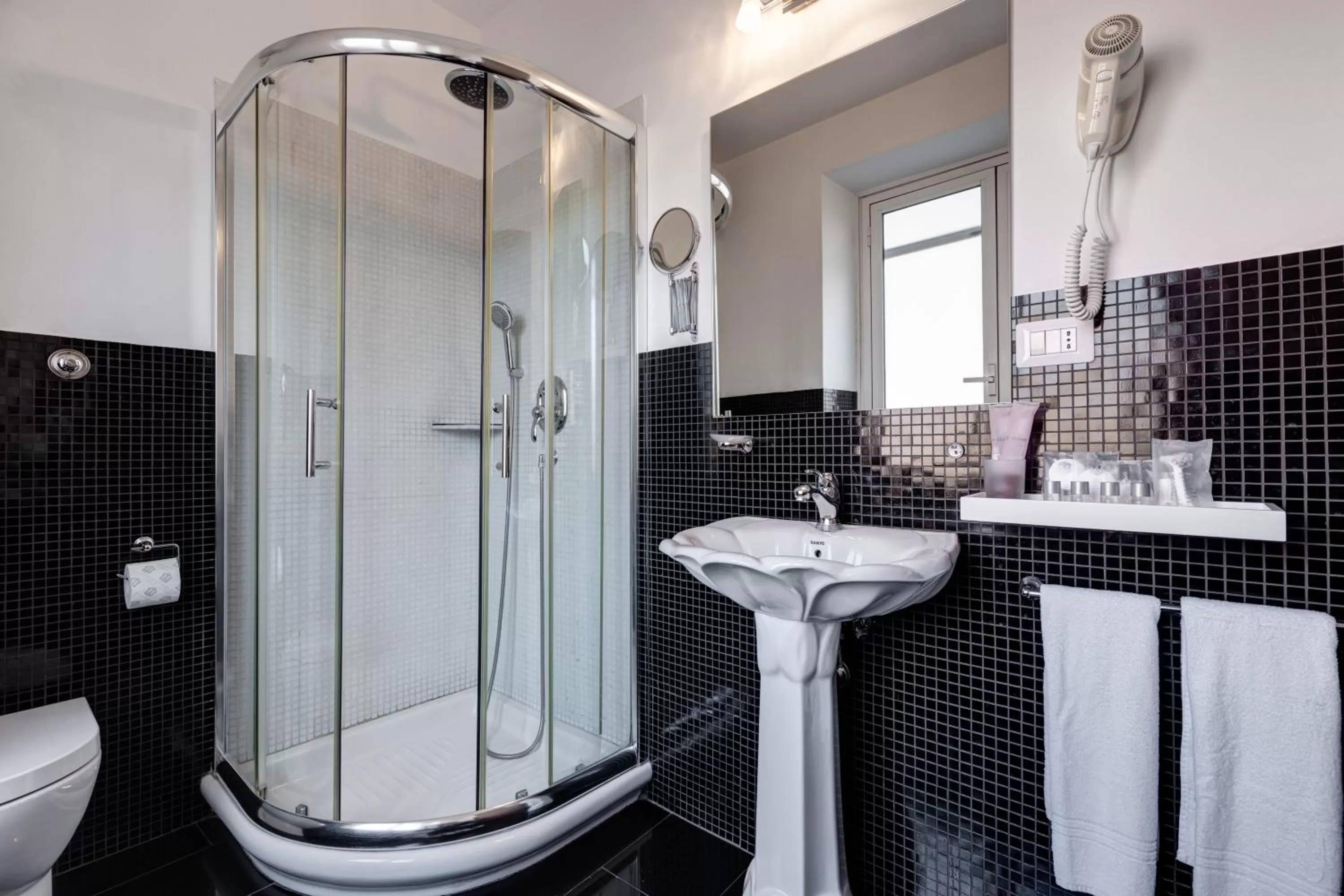 Shower in Little Rhome Suites