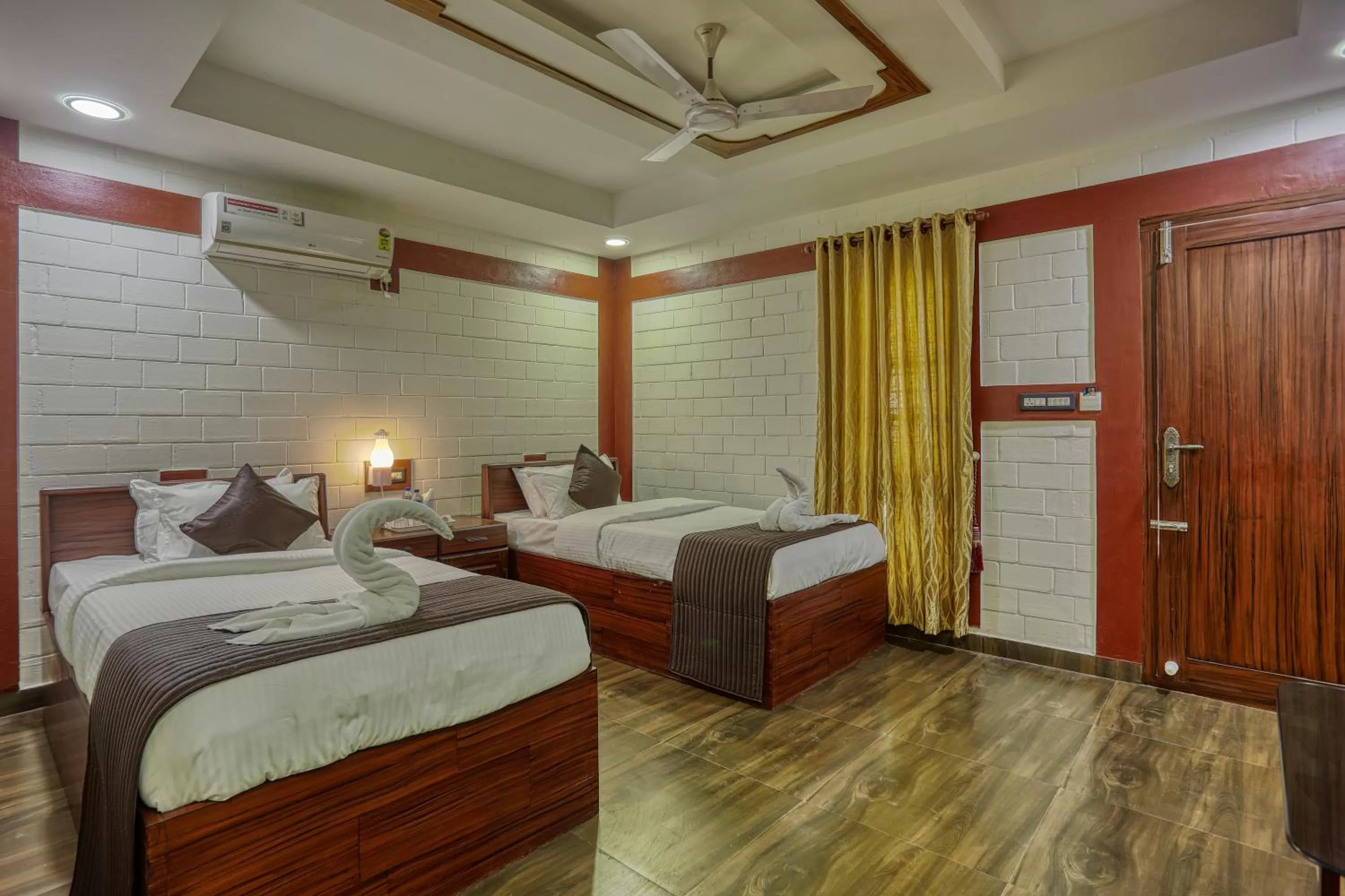 Bed in LEISURE VALLEY BEACH RESORT