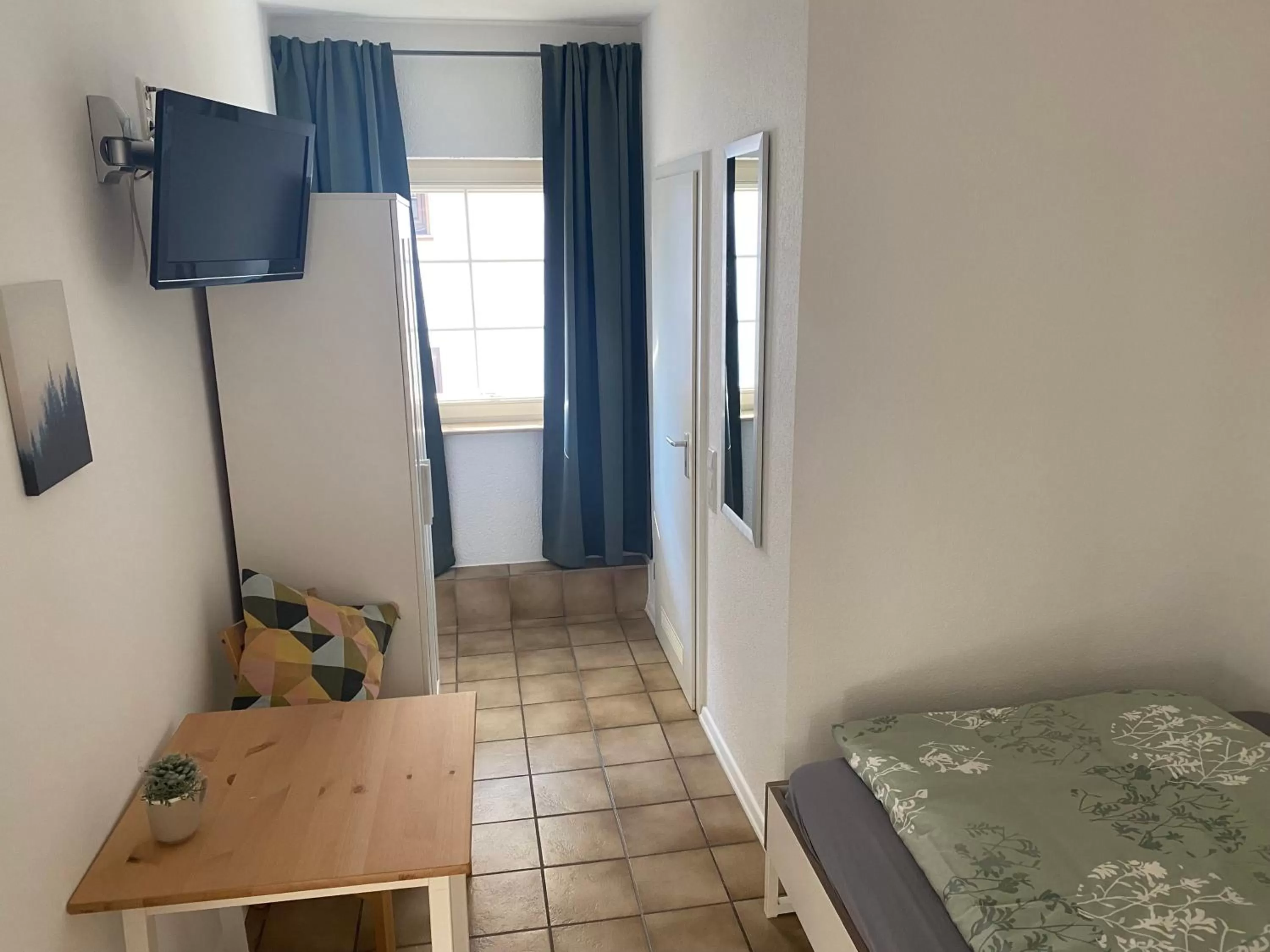 Photo of the whole room, TV/Entertainment Center in Hotel am See