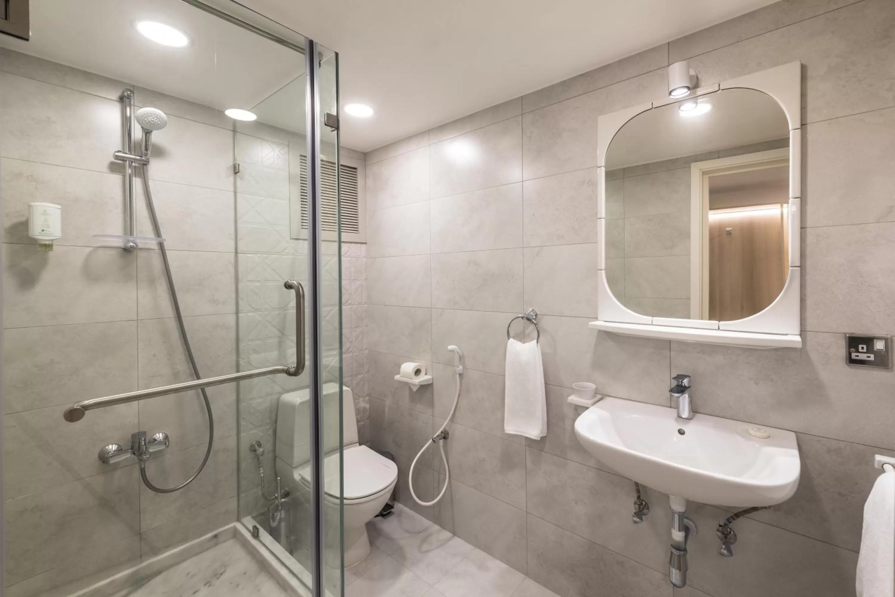 Bedroom in Oasis Hotel