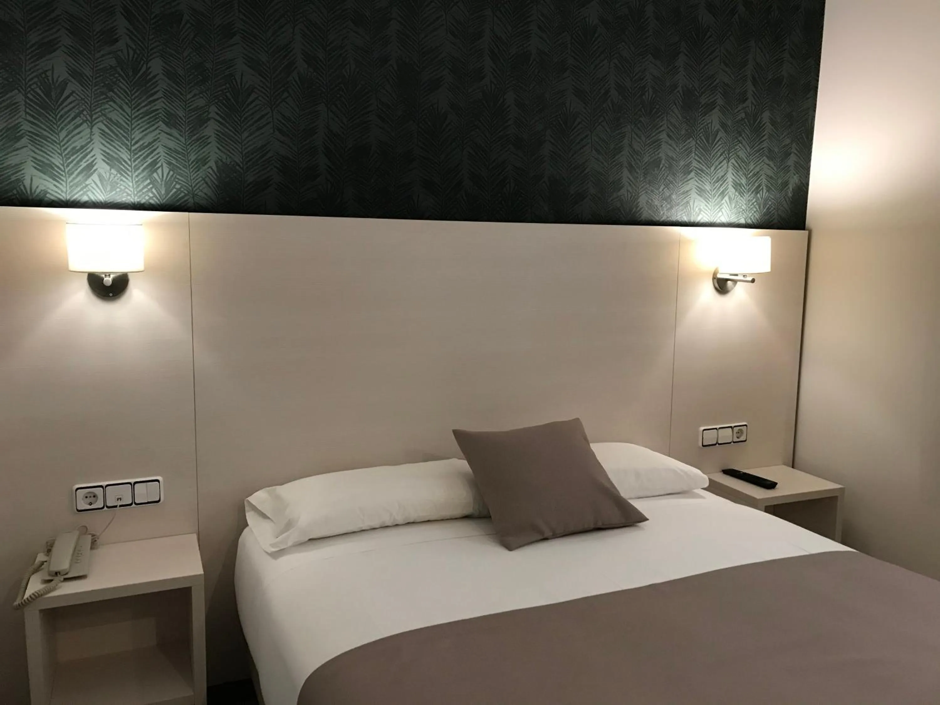 Bed in Hotel Cantón