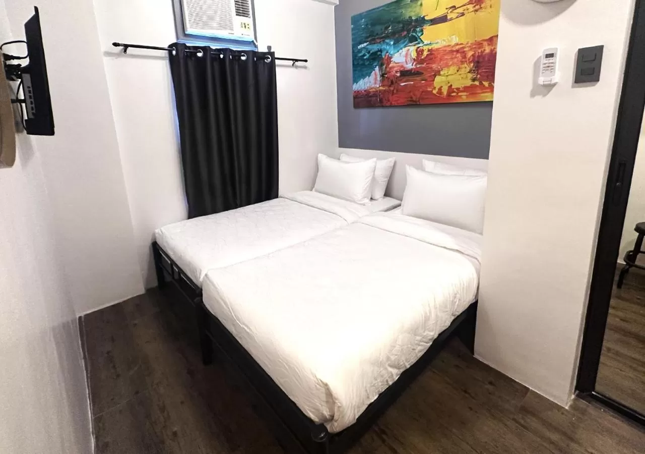 Bed in mySTAY Hotel BGC South